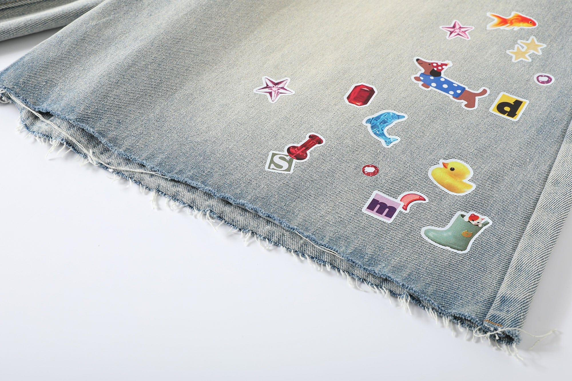 DONSMOKE Whimsical Stickers Washed Raw-Edge Shorts, premium urban and streetwear designers apparel on PROJECTISR.com, DONSMOKE