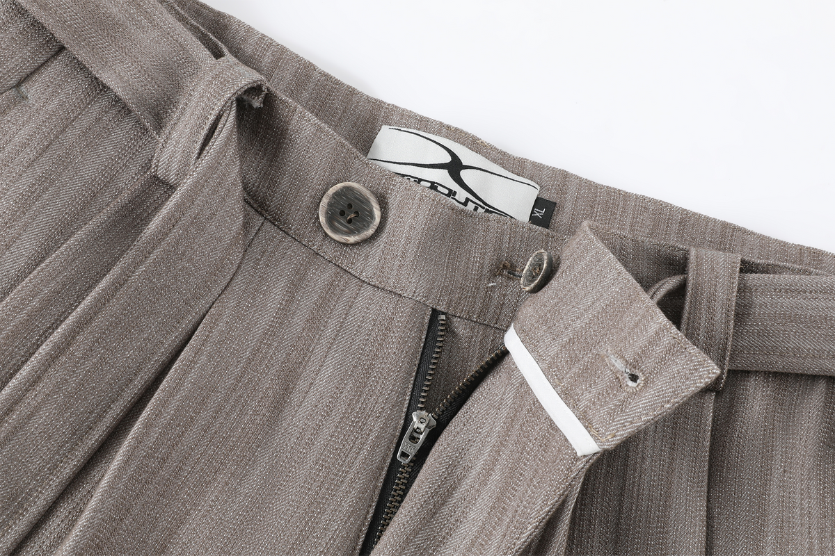 REMODUTION Asymmetrical Pleated Wide-Leg Trousers