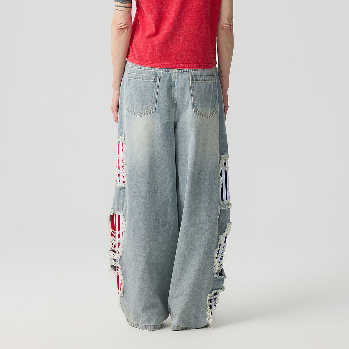 HAHAHA STUDIOS Spliced Distressed Wide-Leg Jeans