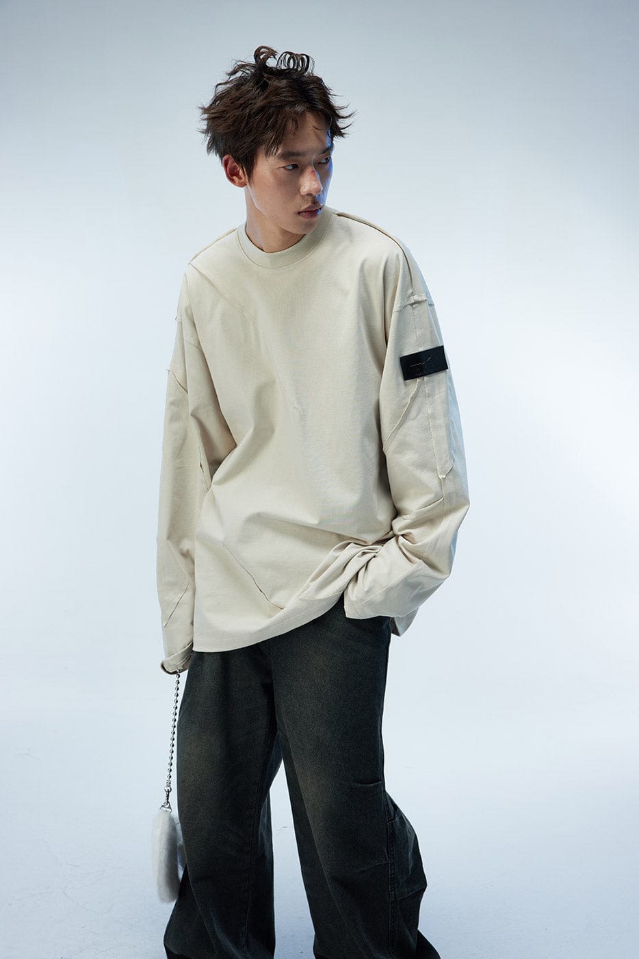 WHISTLEHUNTER Asymmetric Cut Logo Patched L/S Tee, premium urban and streetwear designers apparel on PROJECTISR.com, WHISTLEHUNTER