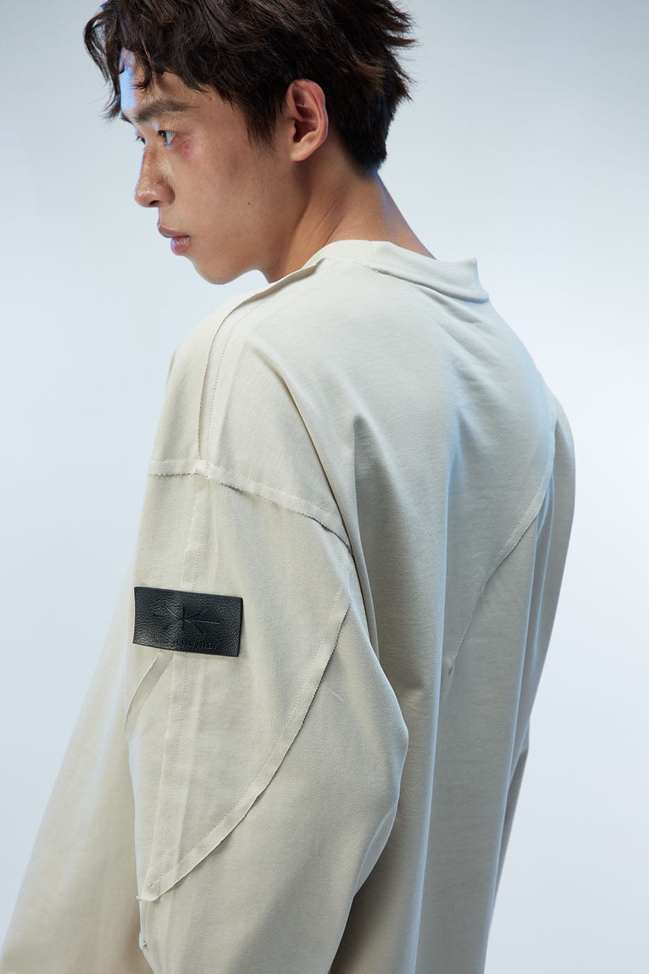 WHISTLEHUNTER Asymmetric Cut Logo Patched L/S Tee, premium urban and streetwear designers apparel on PROJECTISR.com, WHISTLEHUNTER