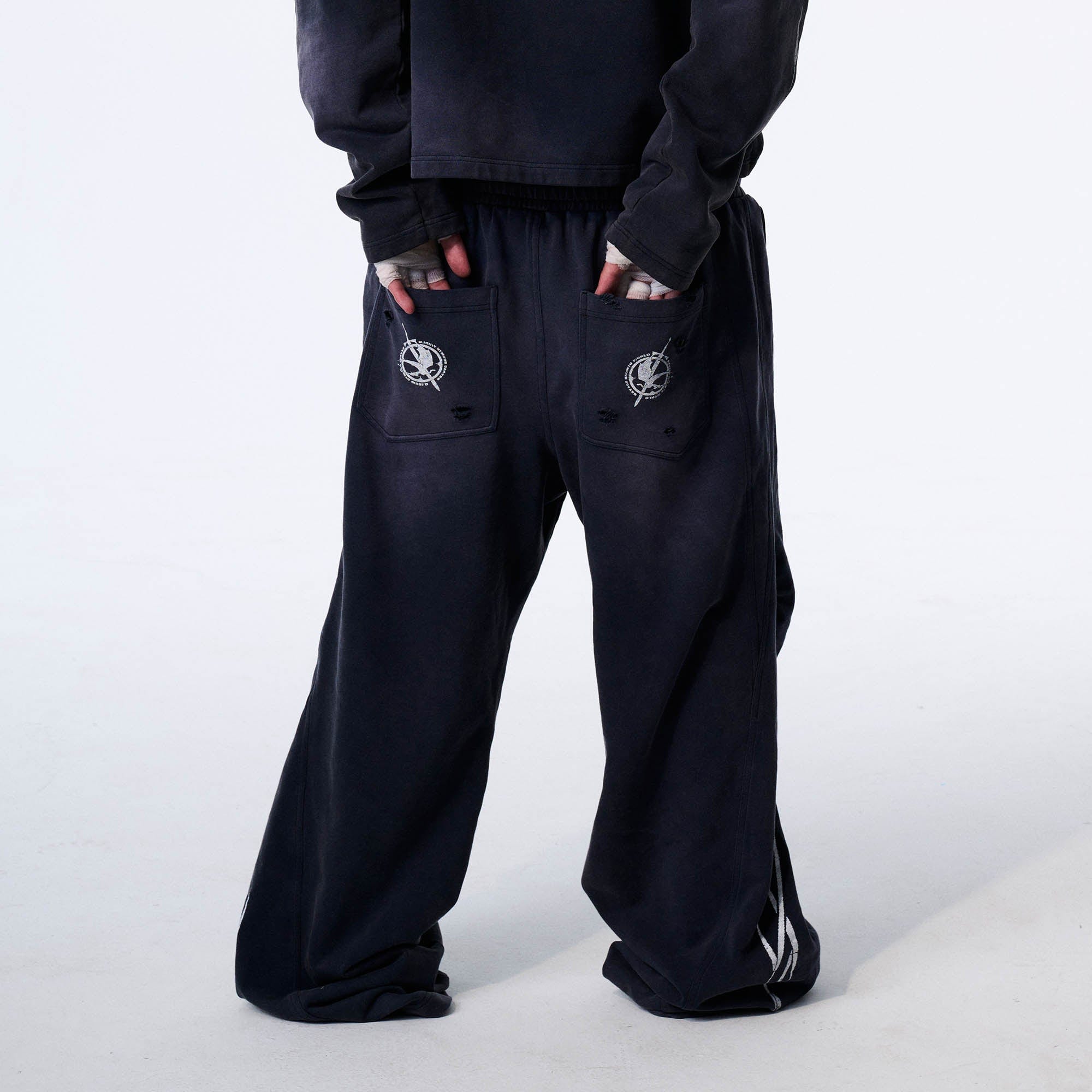 SAVAGEGROWTHWORLD Distressed Pleated Drawstring Baggy Pants, premium urban and streetwear designers apparel on PROJECTISR.com, SAVAGEGROWTHWORLD