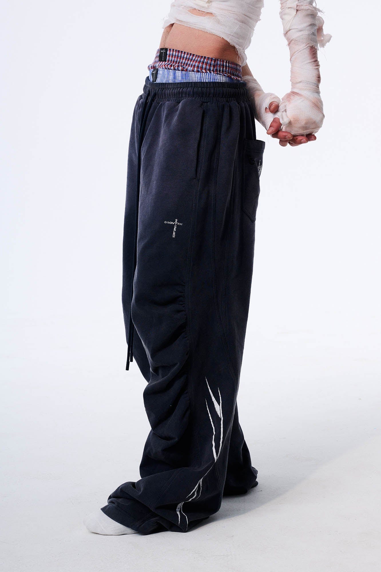 SAVAGEGROWTHWORLD Distressed Pleated Drawstring Baggy Pants, premium urban and streetwear designers apparel on PROJECTISR.com, SAVAGEGROWTHWORLD