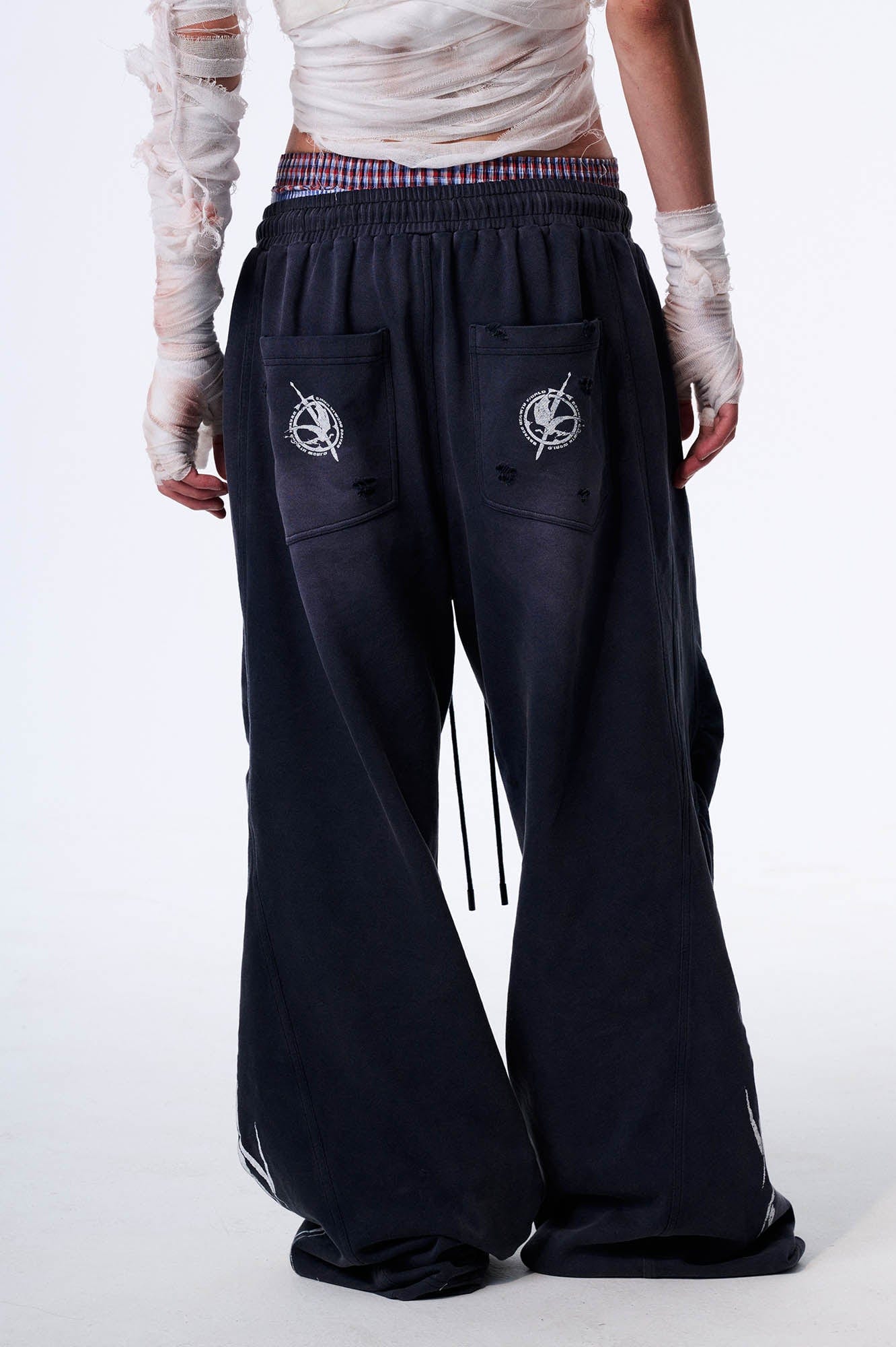 SAVAGEGROWTHWORLD Distressed Pleated Drawstring Baggy Pants, premium urban and streetwear designers apparel on PROJECTISR.com, SAVAGEGROWTHWORLD