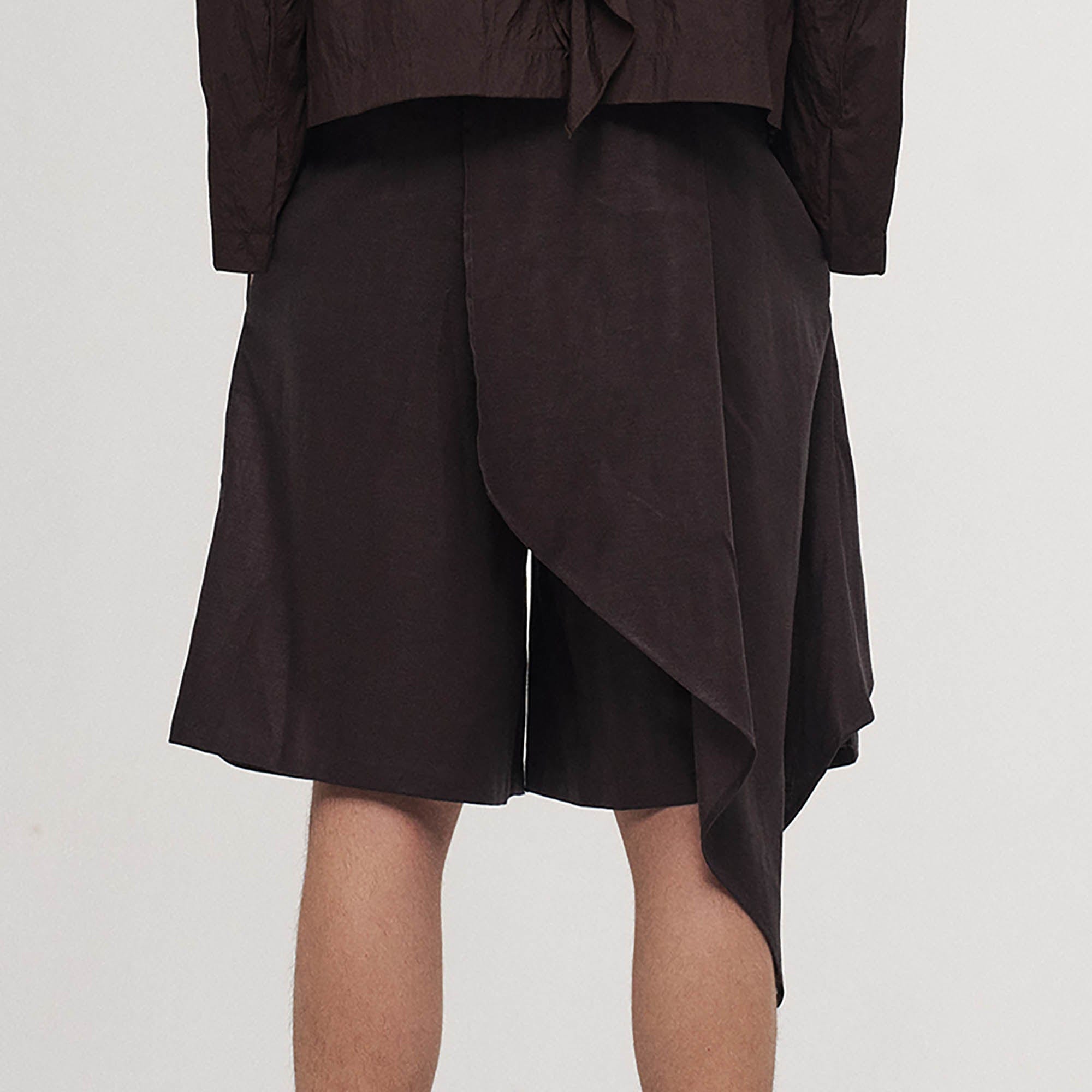 ILNya Nieternite Nifutur Asymmetrical Draped Pleated Shorts, premium urban and streetwear designers apparel on PROJECTISR.com, ILNya Nieternite Nifutur
