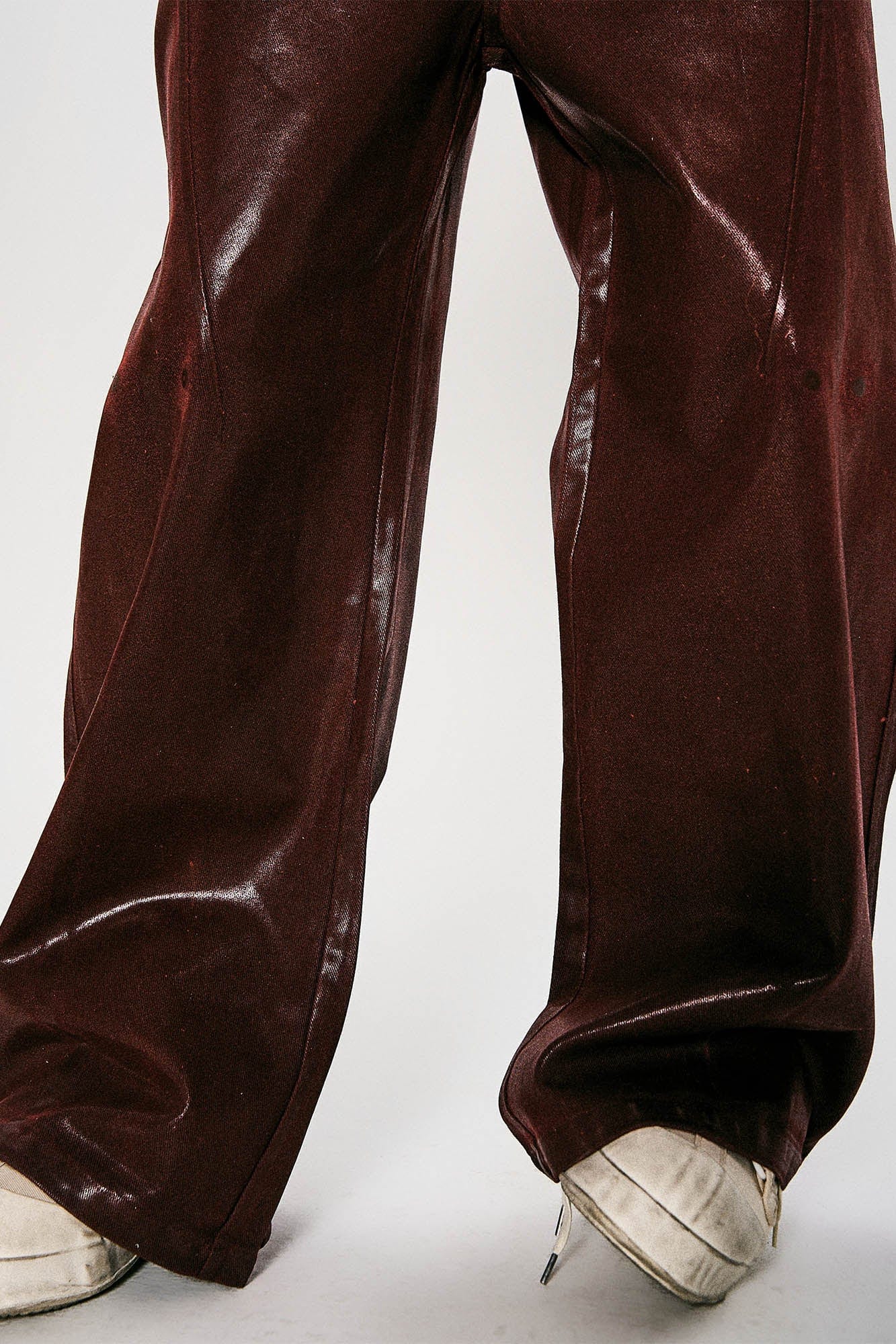 FLYERRER Waxed Spliced Studded Flared Pants, premium urban and streetwear designers apparel on PROJECTISR.com, FLYERRER