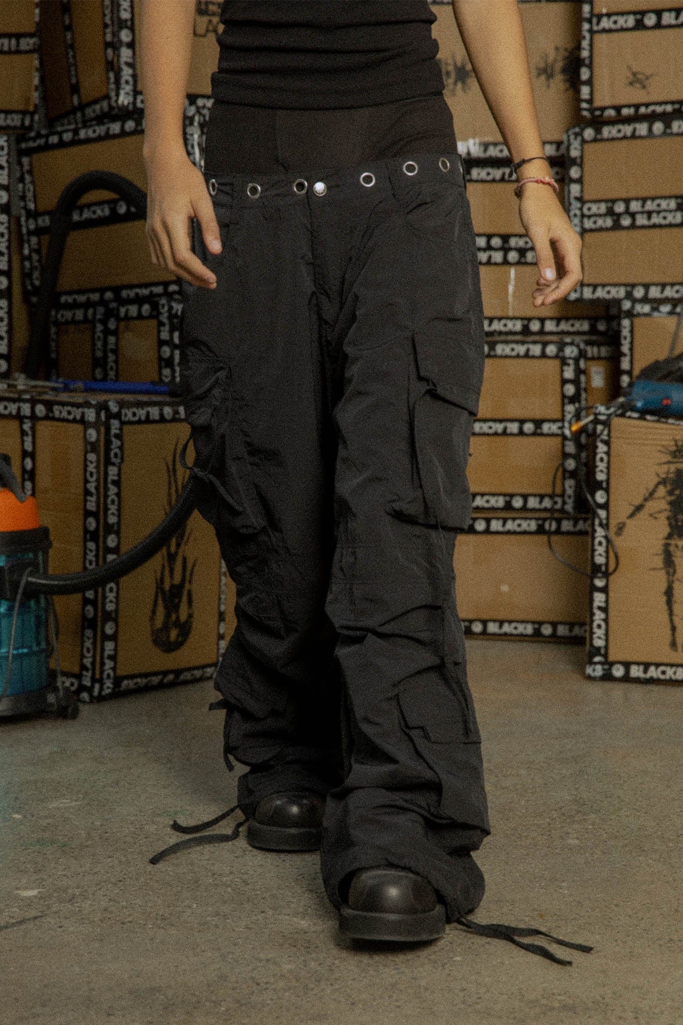 BLACK8MOB Eyelet Waist Tie Multi-Pocket Parachute Pants, premium urban and streetwear designers apparel on PROJECTISR.com, BLACK8MOB