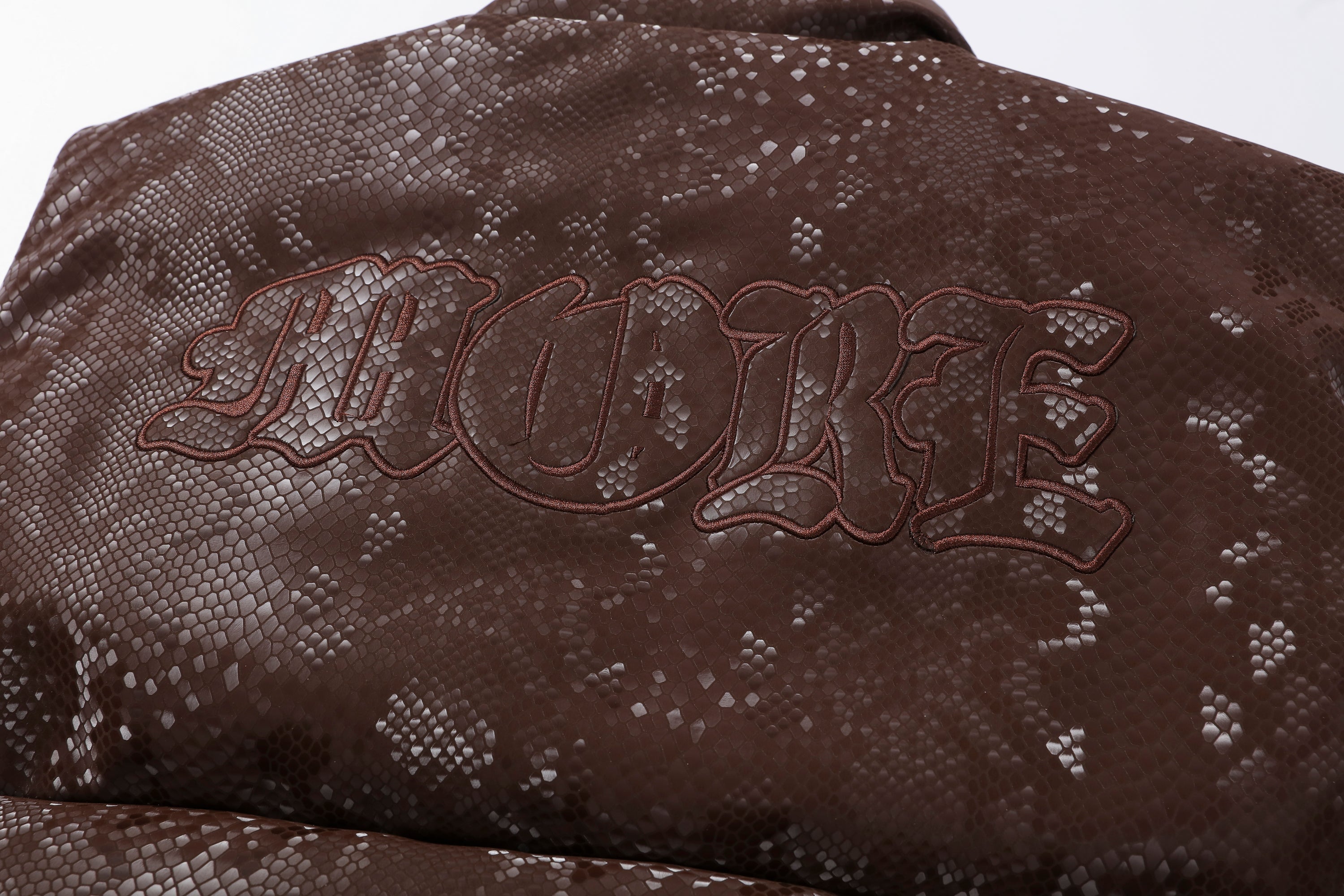 MAKEMORE Scale-Textured PU Embroidered Puffer Vest