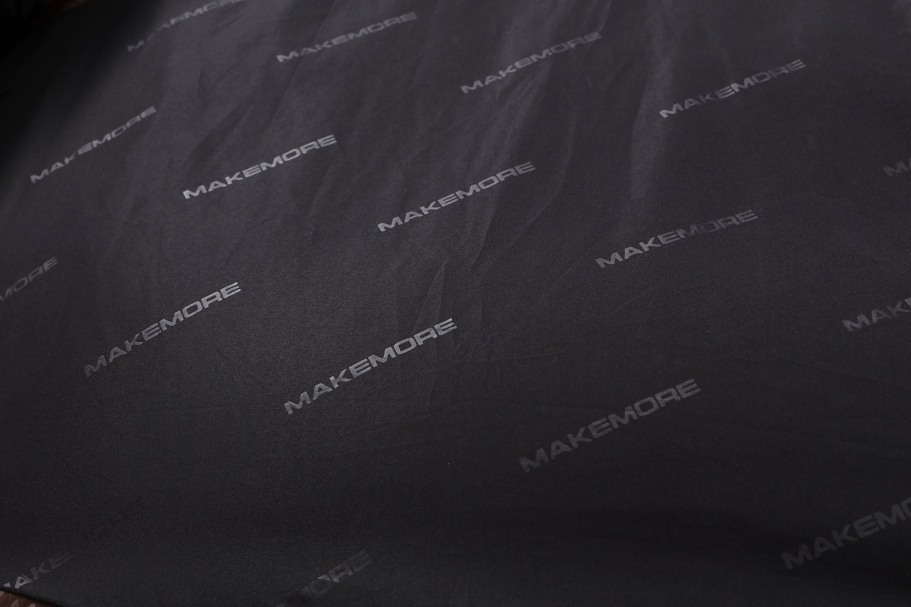 MAKEMORE Scale-Textured PU Embroidered Puffer Vest