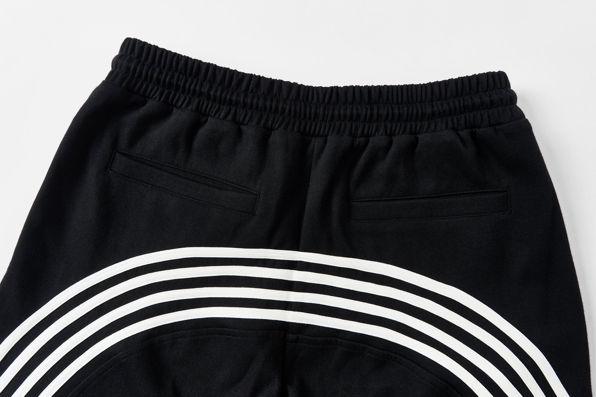 SAVAGEGROWTHWORLD Back-Arc Striped Graphic Track Pants, premium urban and streetwear designers apparel on PROJECTISR.com, SAVAGEGROWTHWORLD