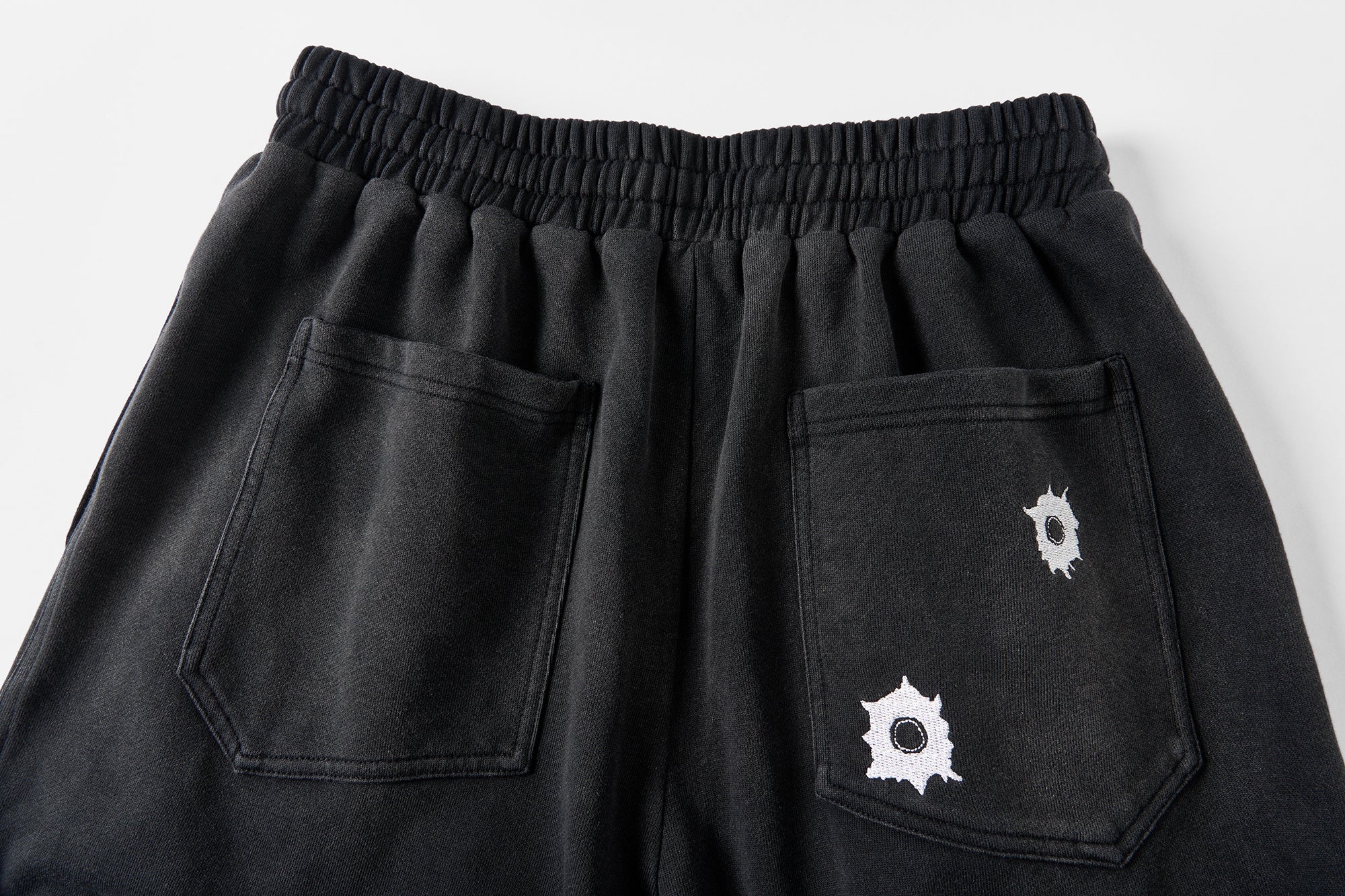 SAVAGEGROWTHWORLD Bullet Graphic Washed Wide-Leg Sweatpants, premium urban and streetwear designers apparel on PROJECTISR.com, SAVAGEGROWTHWORLD