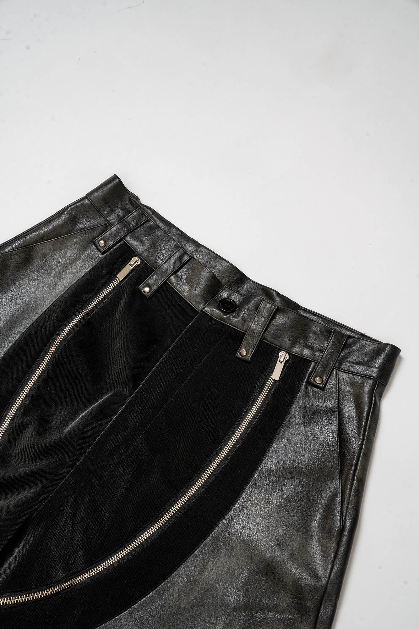 KADAKADA Distressed Curved Zipper PU Oversized Shorts, premium urban and streetwear designers apparel on PROJECTISR.com, KADAKADA