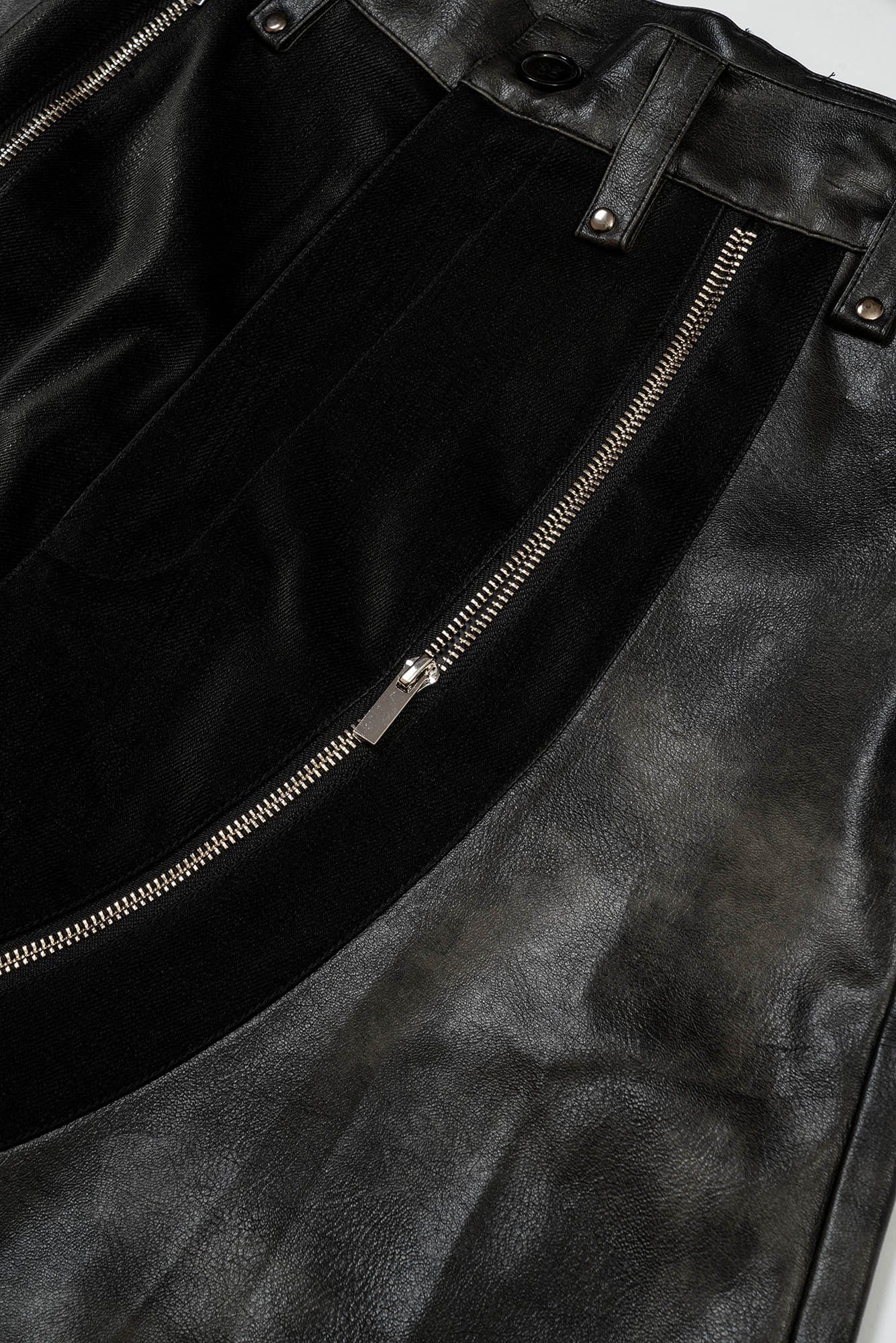 KADAKADA Distressed Curved Zipper PU Oversized Shorts, premium urban and streetwear designers apparel on PROJECTISR.com, KADAKADA