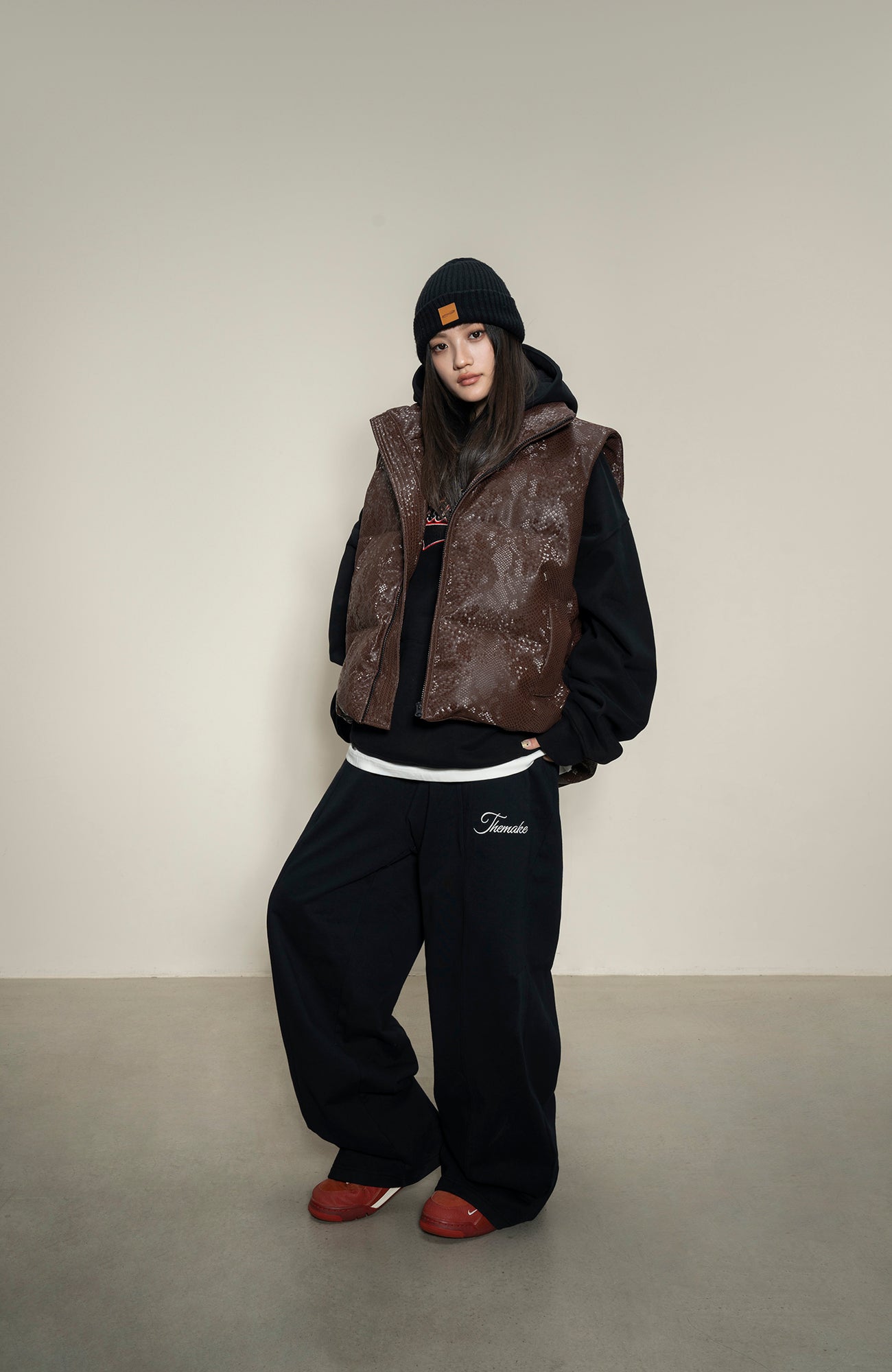 MAKEMORE Scale-Textured PU Embroidered Puffer Vest