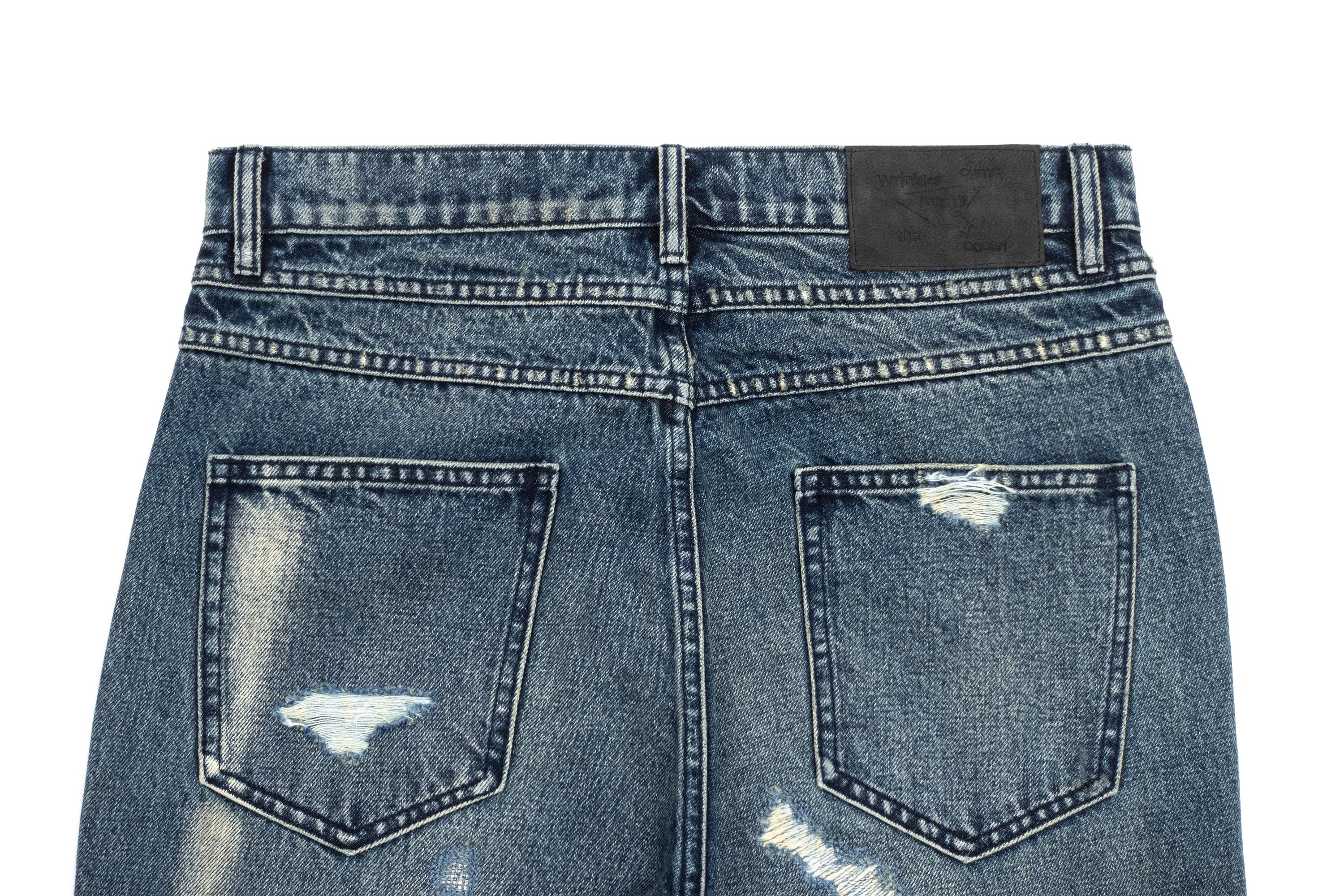 IN EXISTENCE Distressed Stitched Patch Flared Jeans