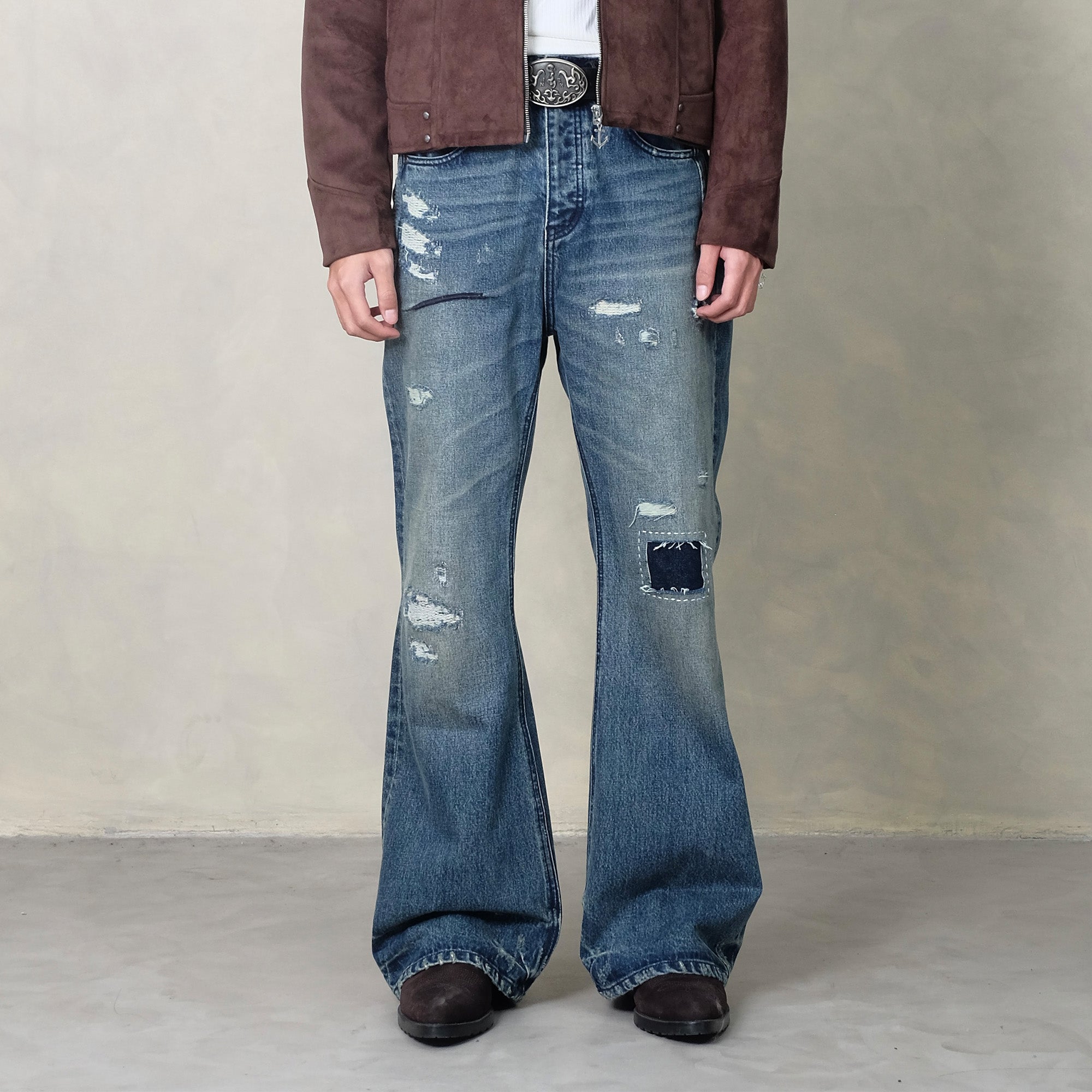 IN EXISTENCE Distressed Stitched Patch Flared Jeans