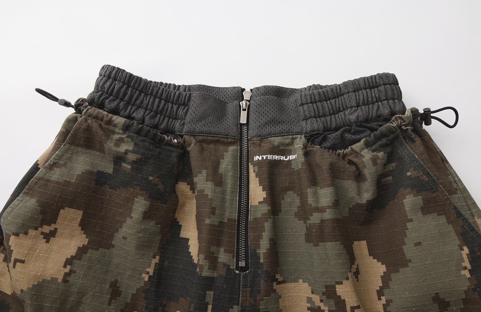 INTERRUPT Camo Back Zip Double-Layer Shorts