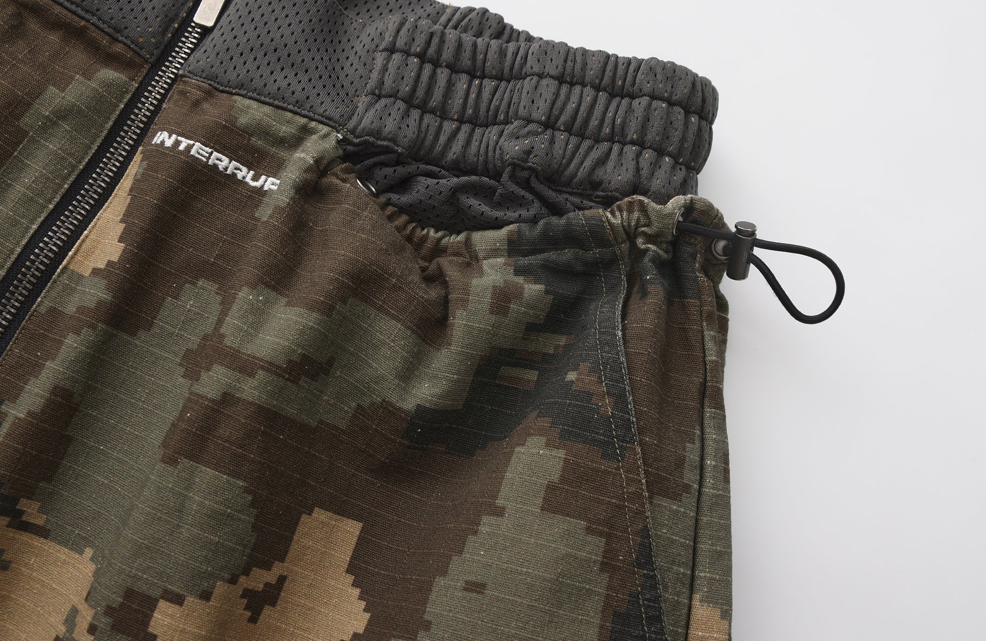 INTERRUPT Camo Back Zip Double-Layer Shorts
