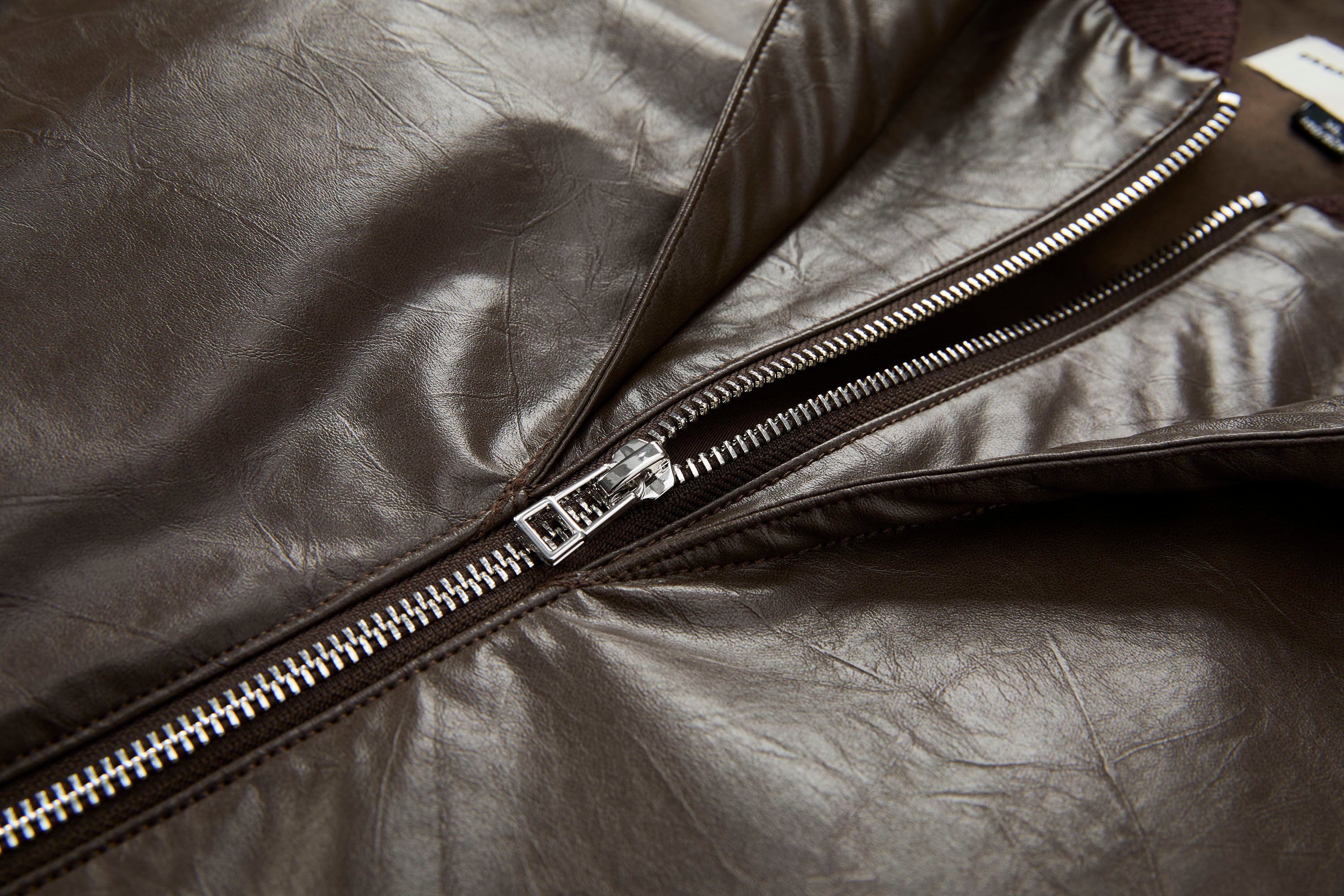 ORGANIC EMOTION Deconstructed PU Oversized Puffer Jacket