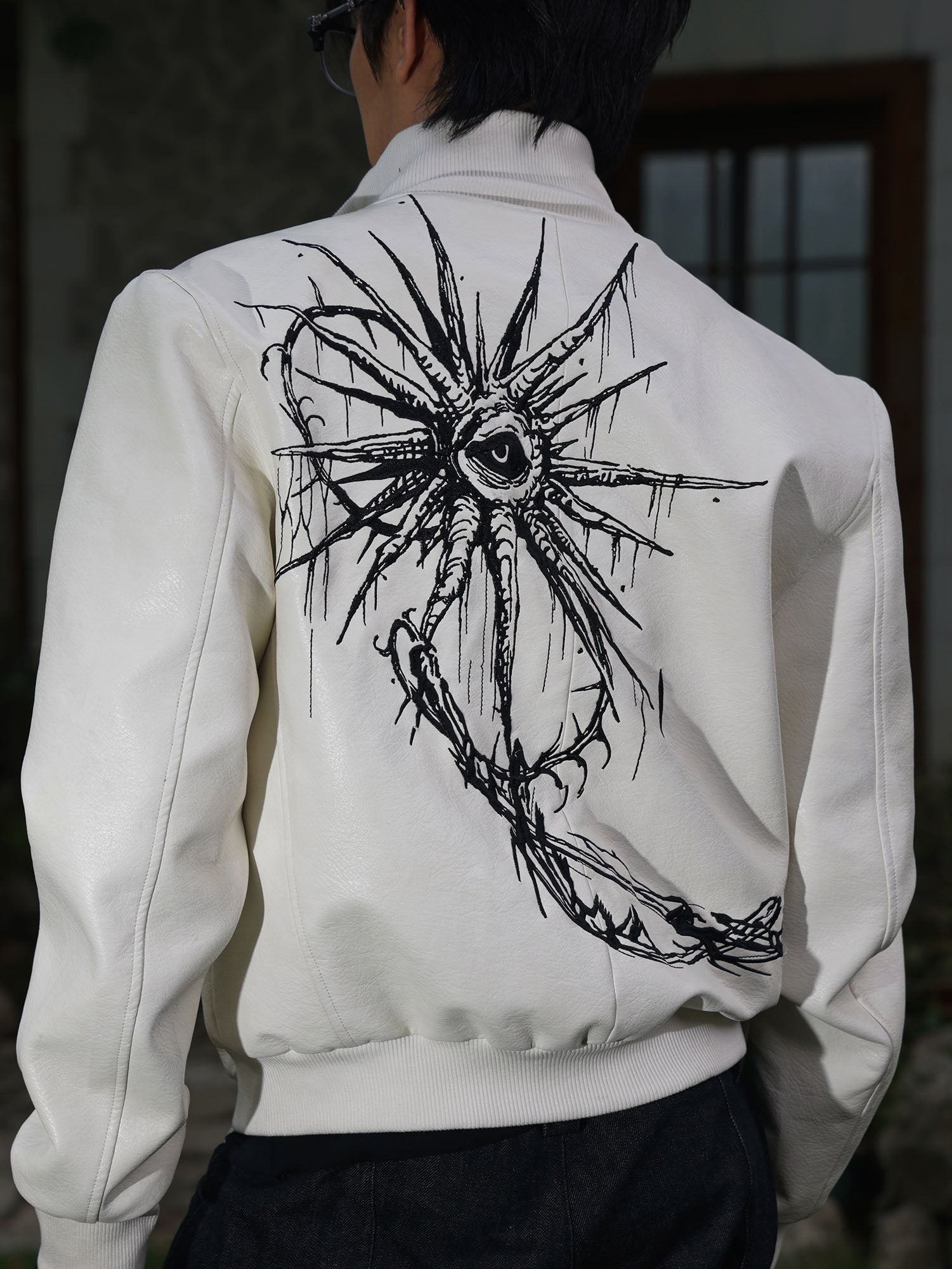 FLYERRER Thorned Eye Graphic Faux Leather Jacket