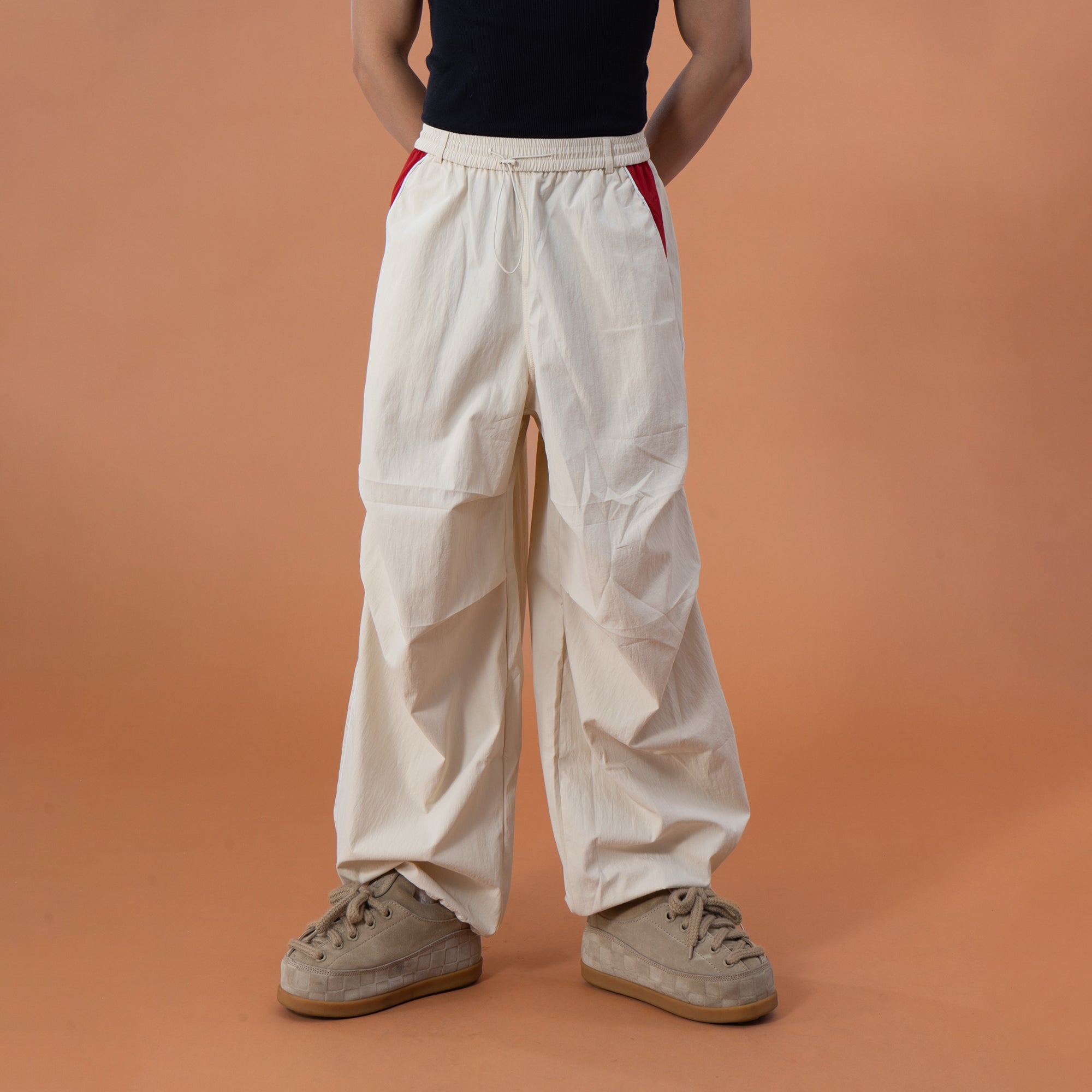 CLP Contrast Panel Pleated-Knee Drawstring-Hem Pants
