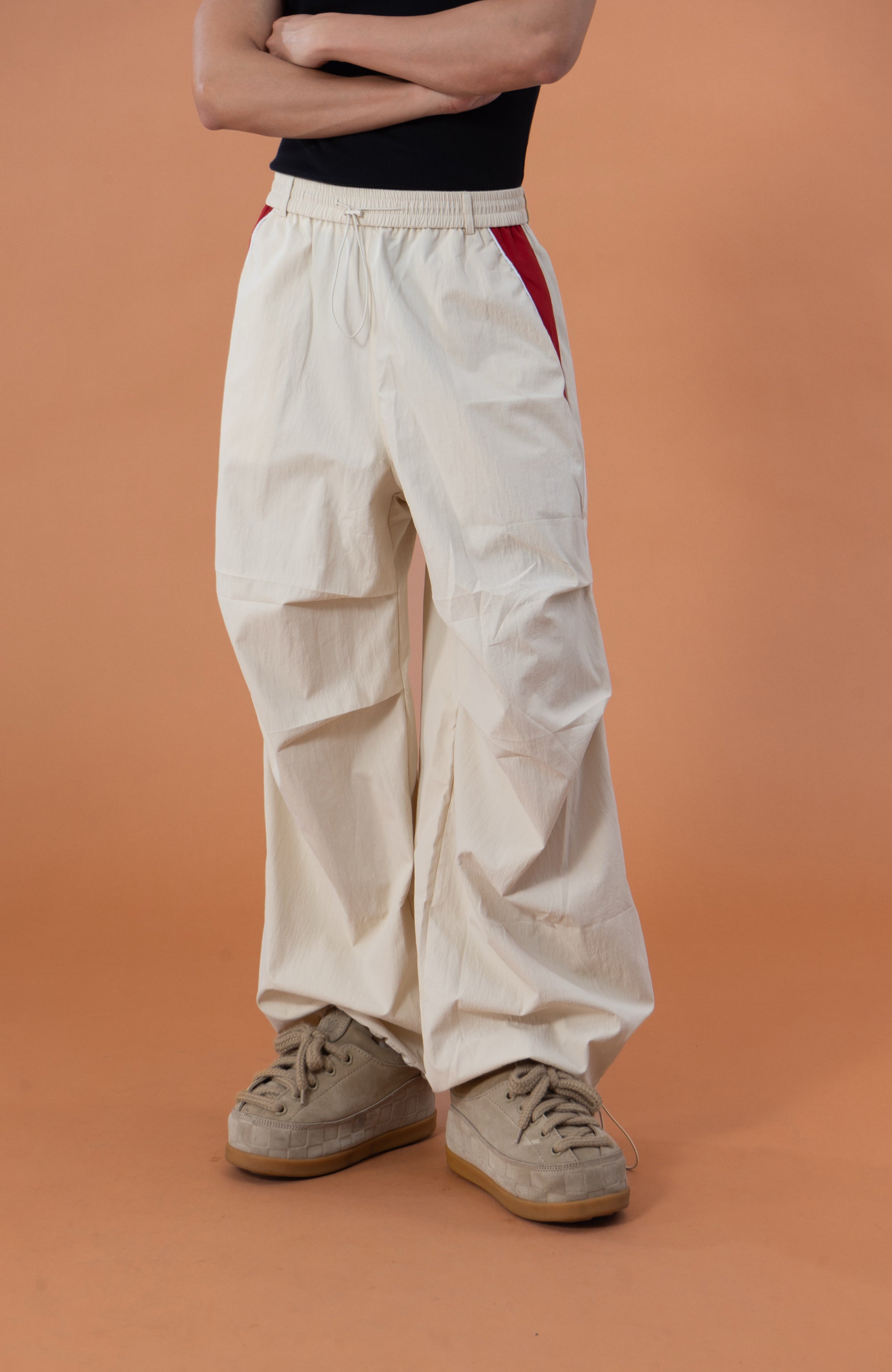 CLP Contrast Panel Pleated-Knee Drawstring-Hem Pants