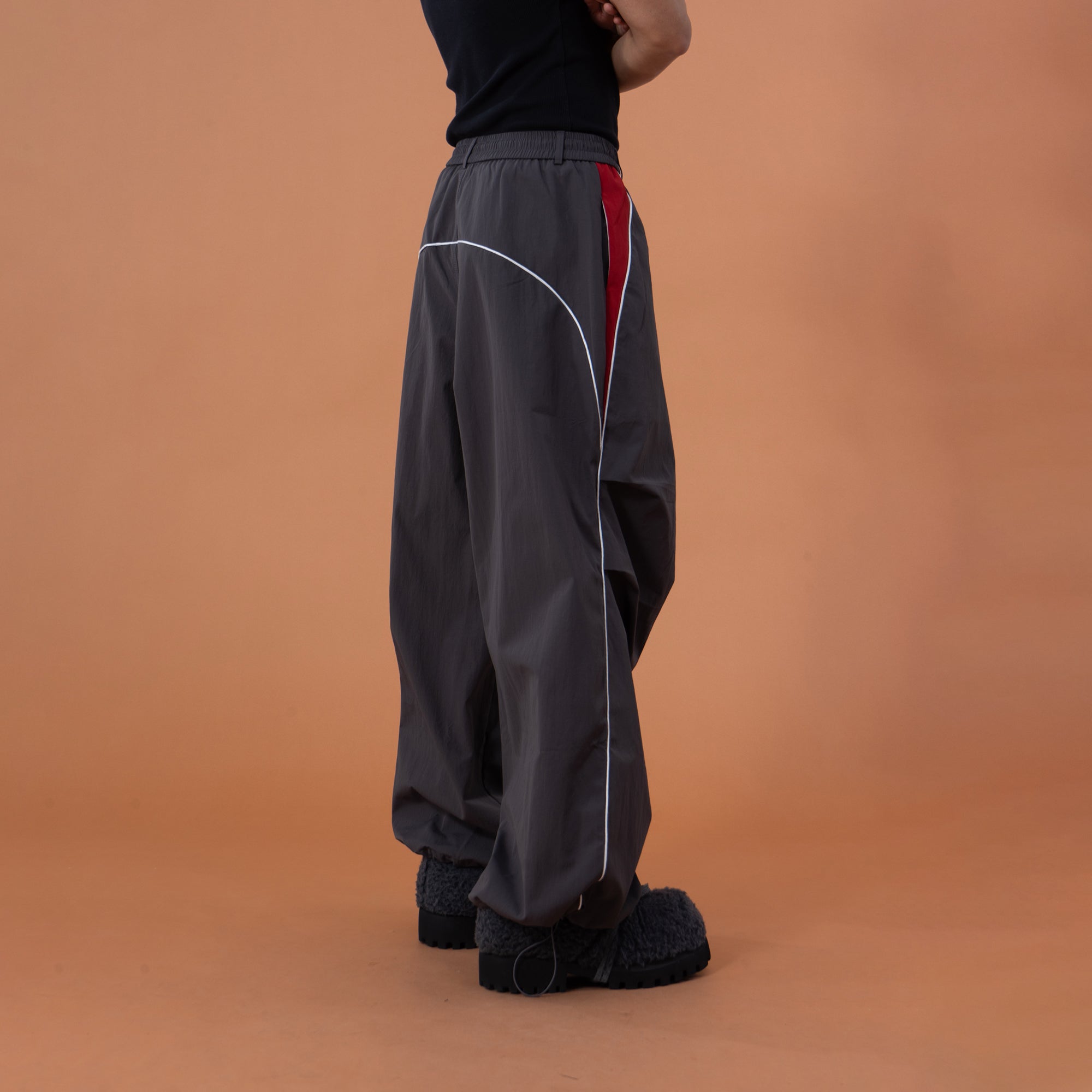 CLP Contrast Panel Pleated-Knee Drawstring-Hem Pants
