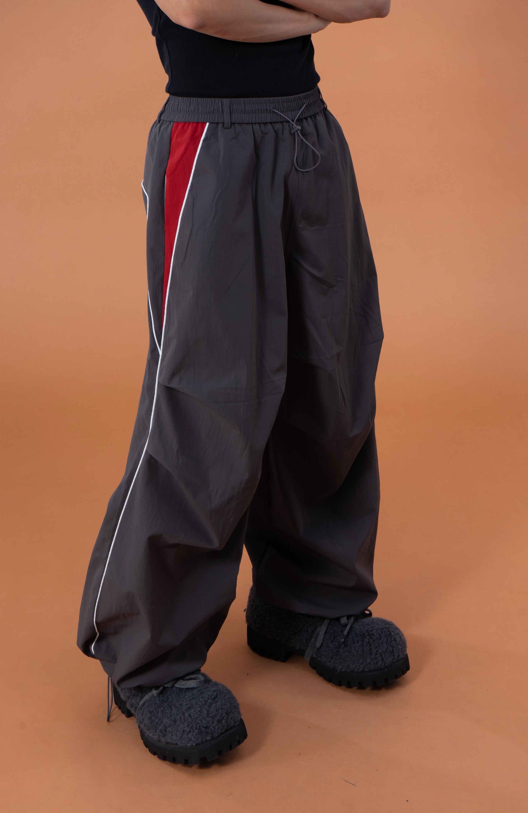 CLP Contrast Panel Pleated-Knee Drawstring-Hem Pants