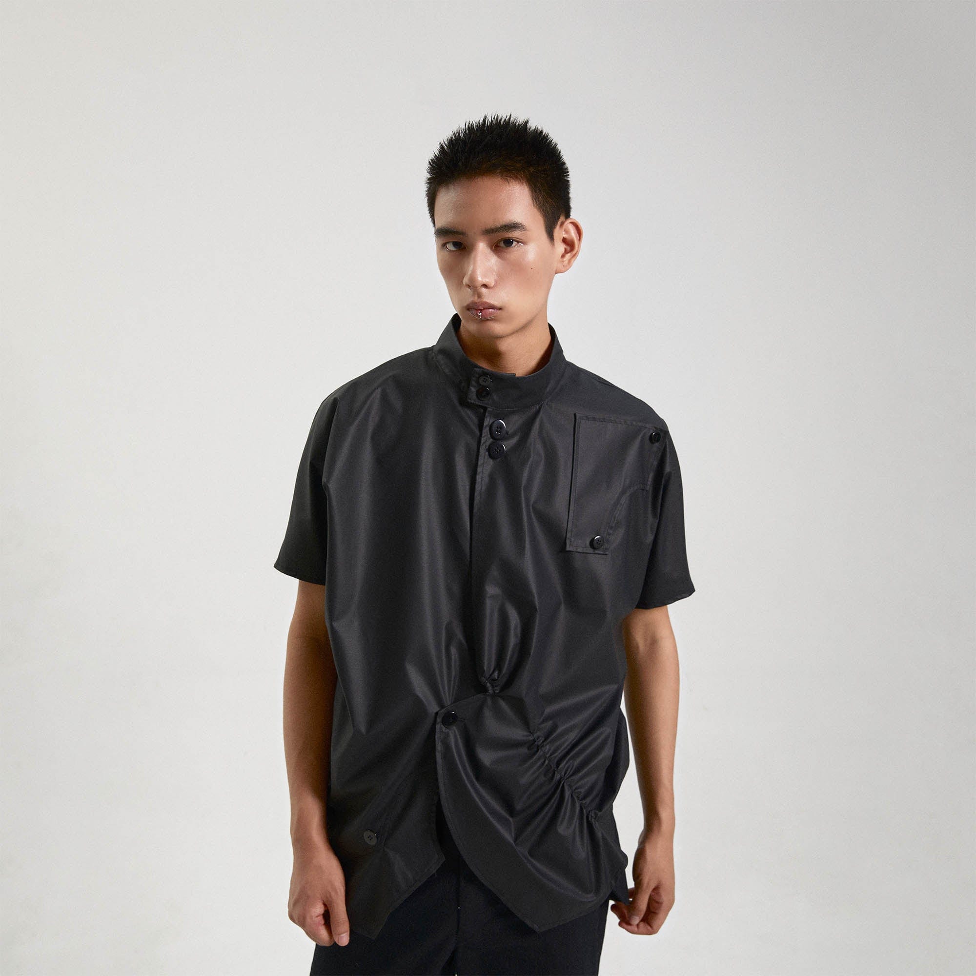 KADAKADA Asymmetrical Pleated Faux Leather Half Shirt, premium urban and streetwear designers apparel on PROJECTISR.com, KADAKADA