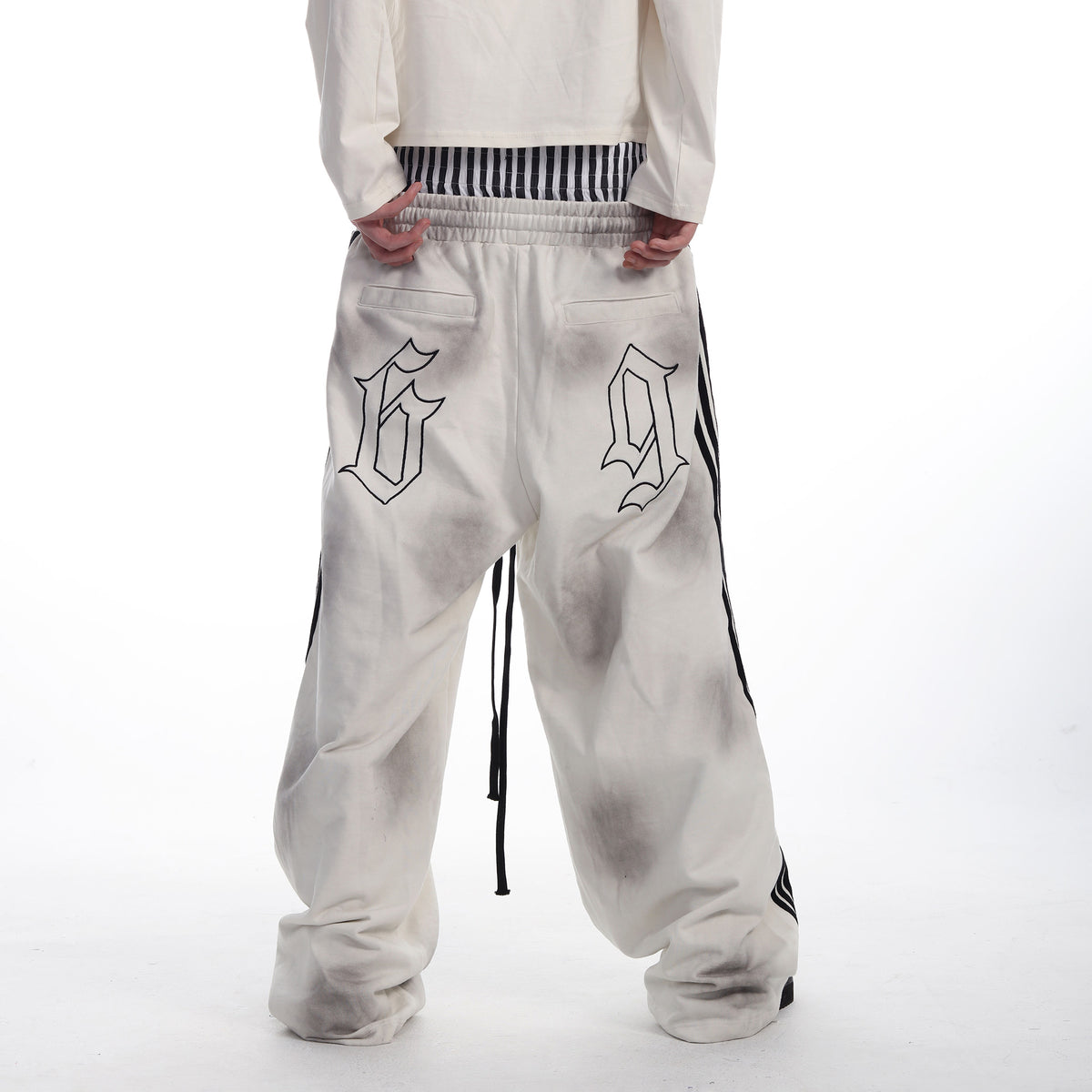 SEXXDEVIL Striped Embroidered Paint-Splattered Sweatpants
