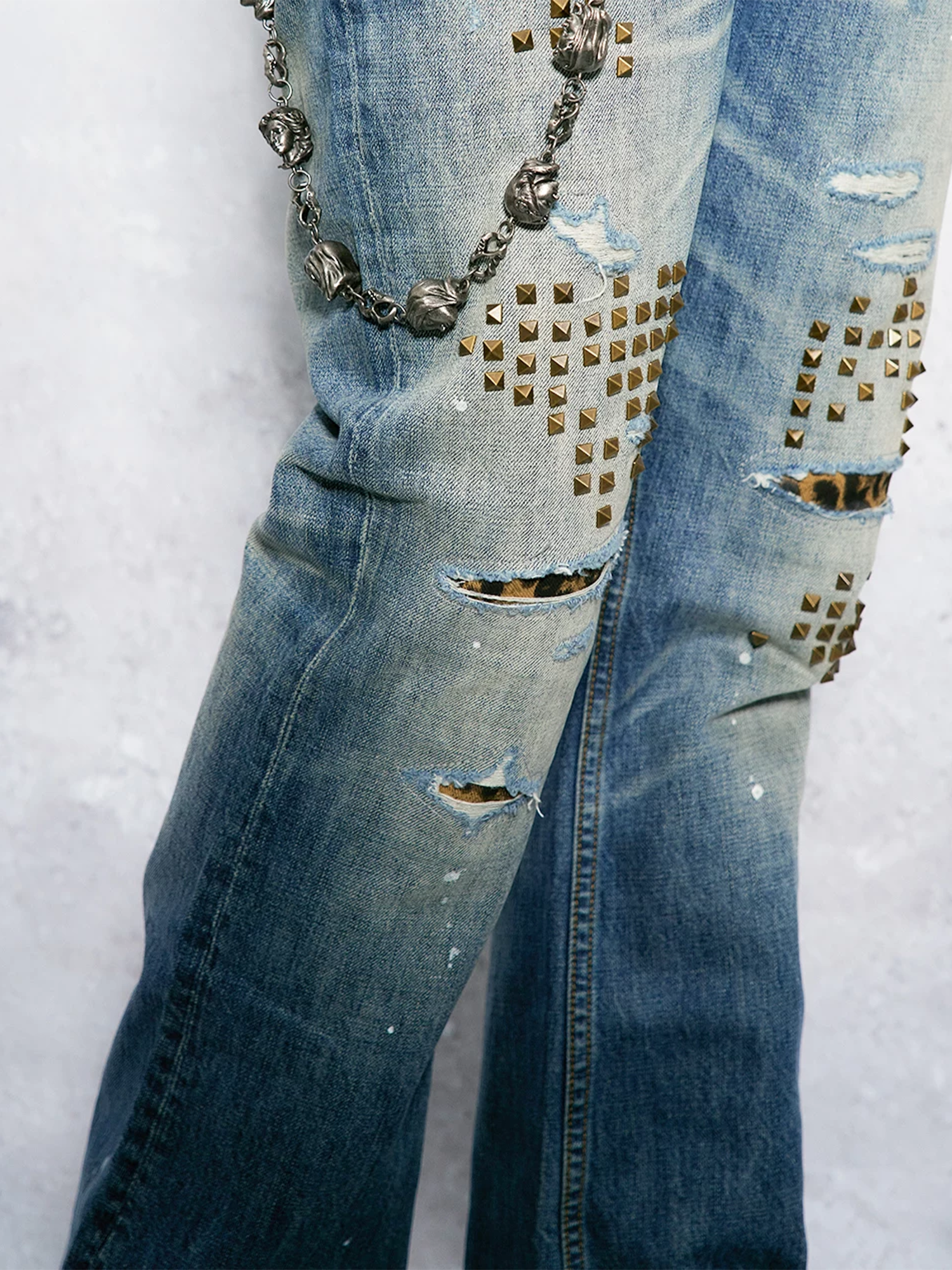 WANNA LAB Distressed Leopard Patch Studded Paint-Splattered Flared Jeans