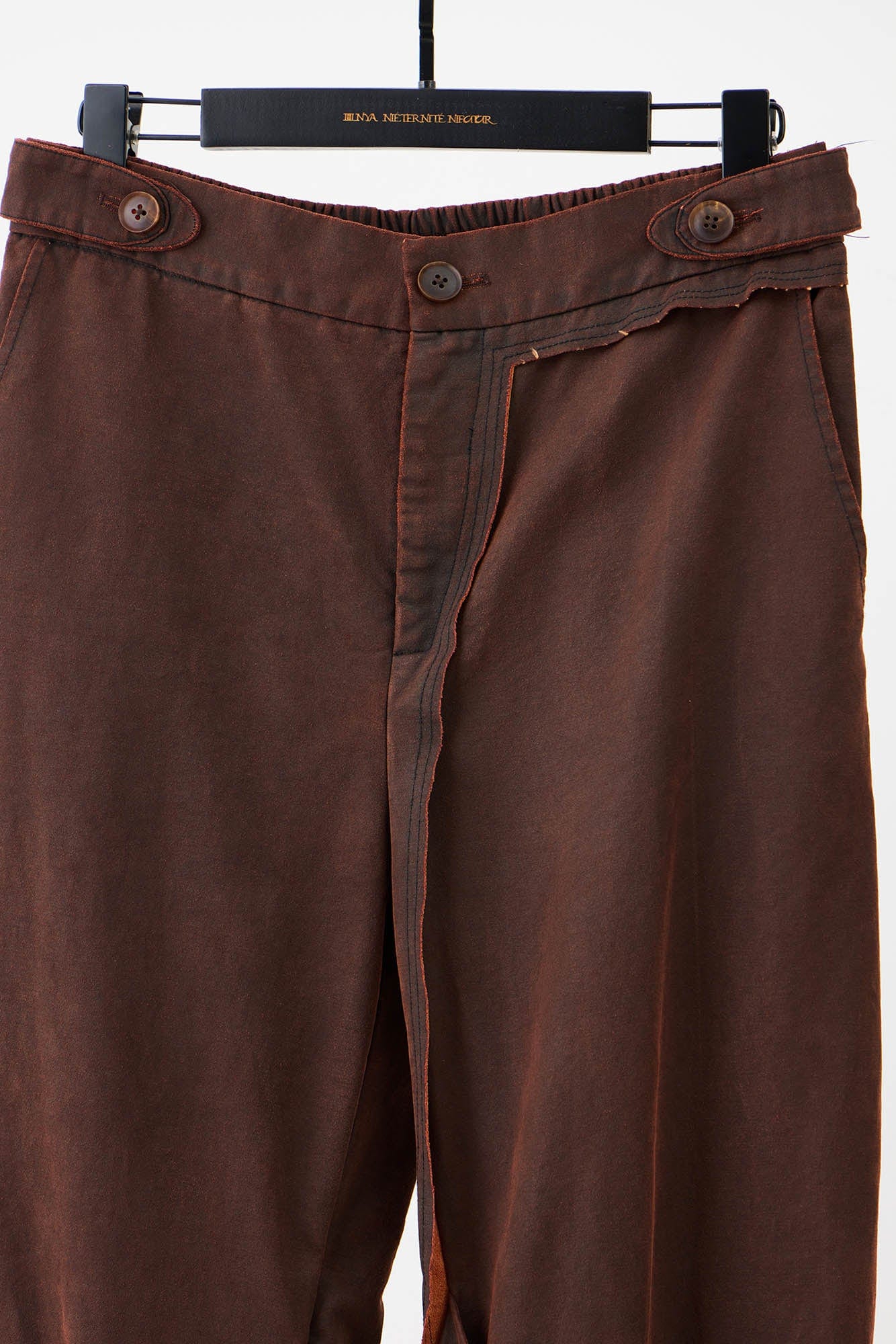 ILNya Nieternite Nifutur Weathered Coated Deconstructed Trousers, premium urban and streetwear designers apparel on PROJECTISR.com, ILNya Nieternite Nifutur
