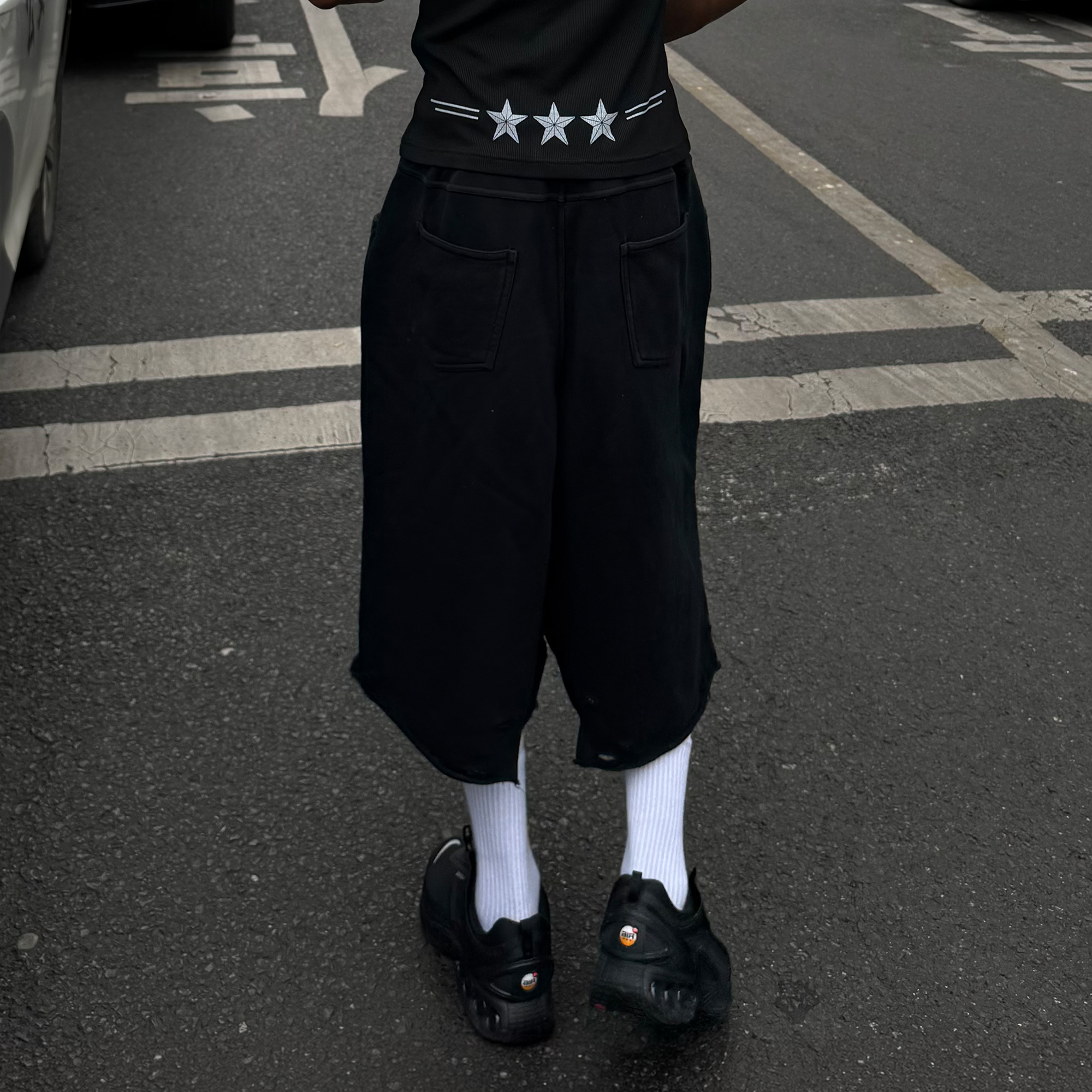 STEEPC Raw Edge Graphic Paneled Sweat Shorts