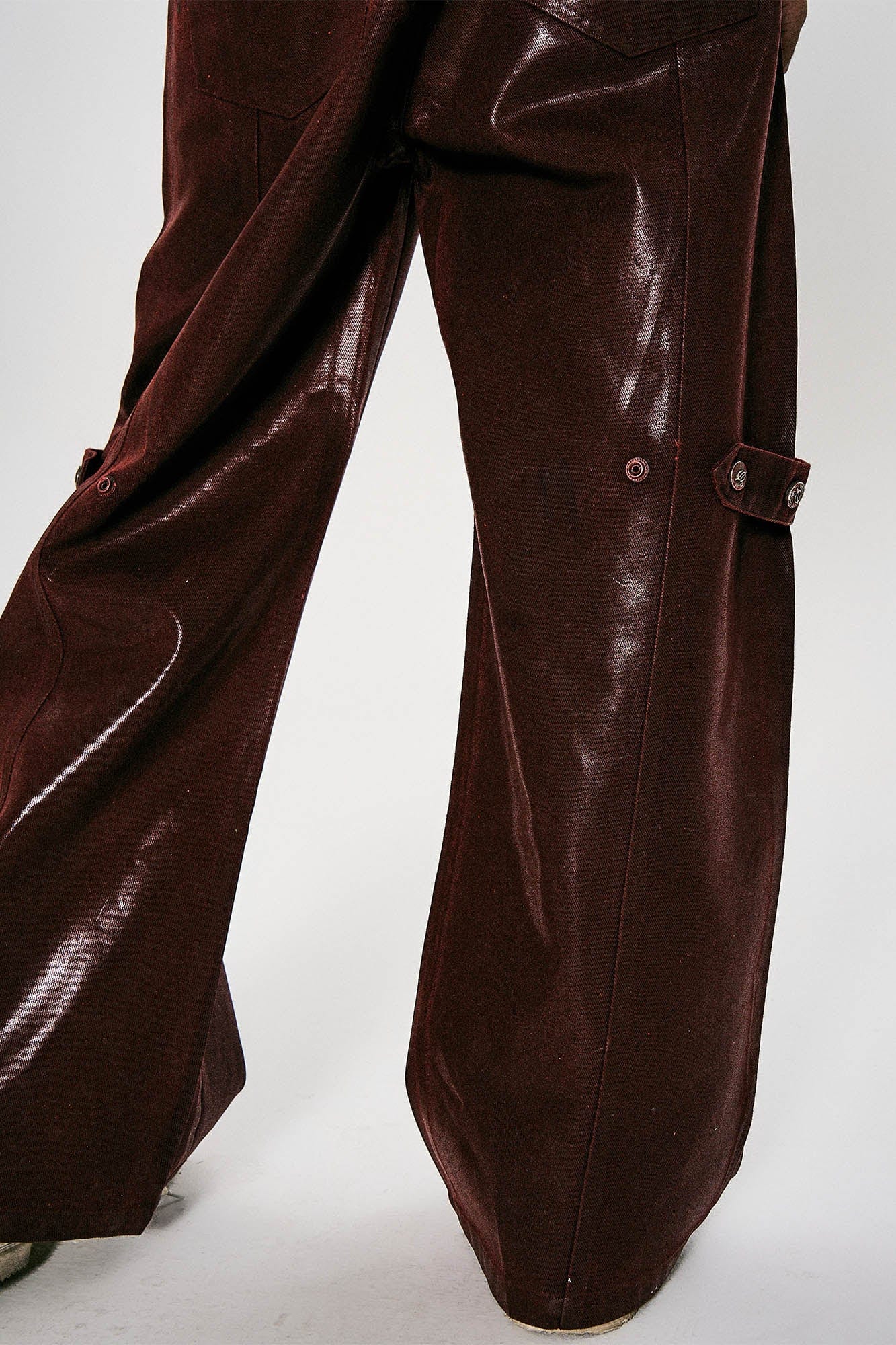 FLYERRER Waxed Spliced Studded Flared Pants, premium urban and streetwear designers apparel on PROJECTISR.com, FLYERRER