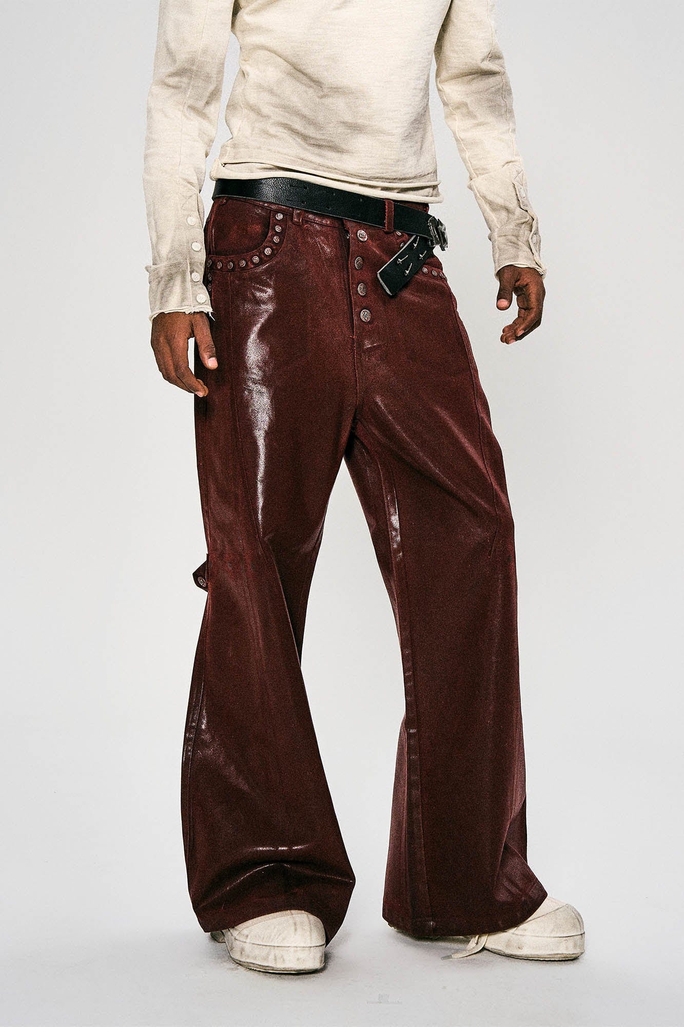 FLYERRER Waxed Spliced Studded Flared Pants, premium urban and streetwear designers apparel on PROJECTISR.com, FLYERRER