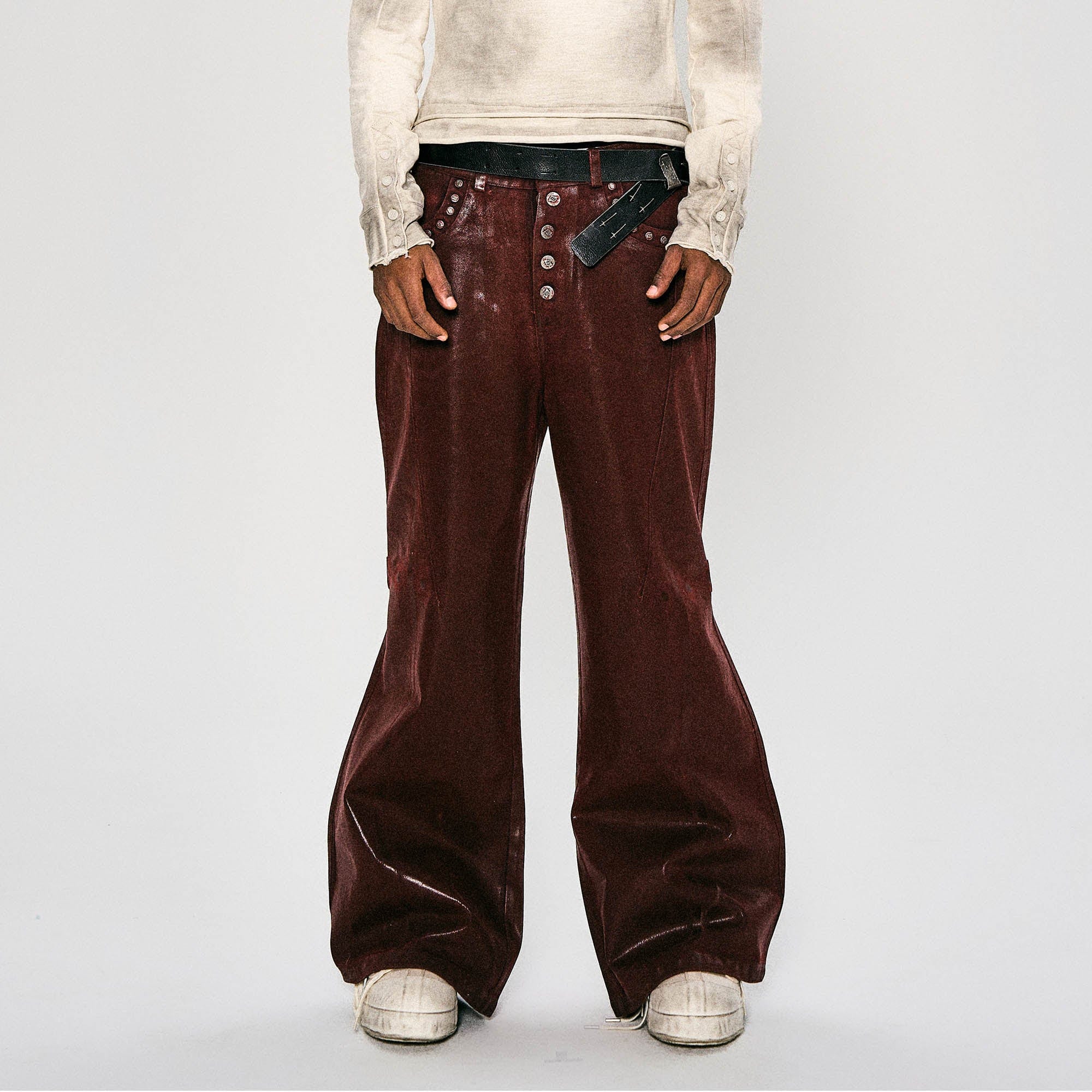 FLYERRER Waxed Spliced Studded Flared Pants, premium urban and streetwear designers apparel on PROJECTISR.com, FLYERRER