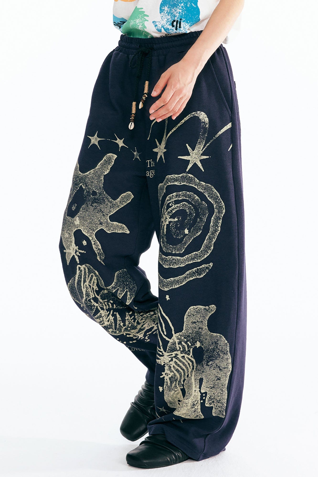 1997 POSTOFFICE Tribal Spiral Beaded Drawstring Sweatpants, premium urban and streetwear designers apparel on PROJECTISR.com, 1997 POSTOFFICE