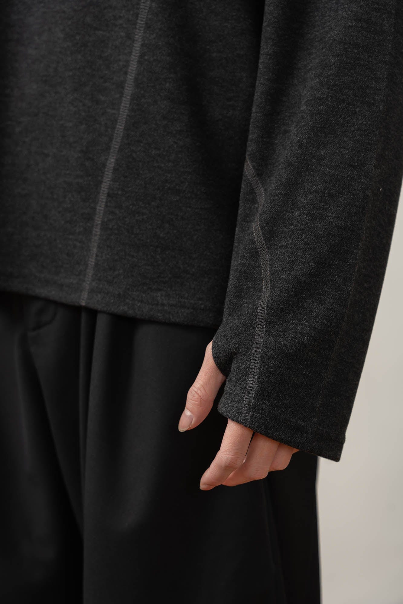 MOITIEDEPETALE Asymmetrical Collar Stitch Spliced Pullover