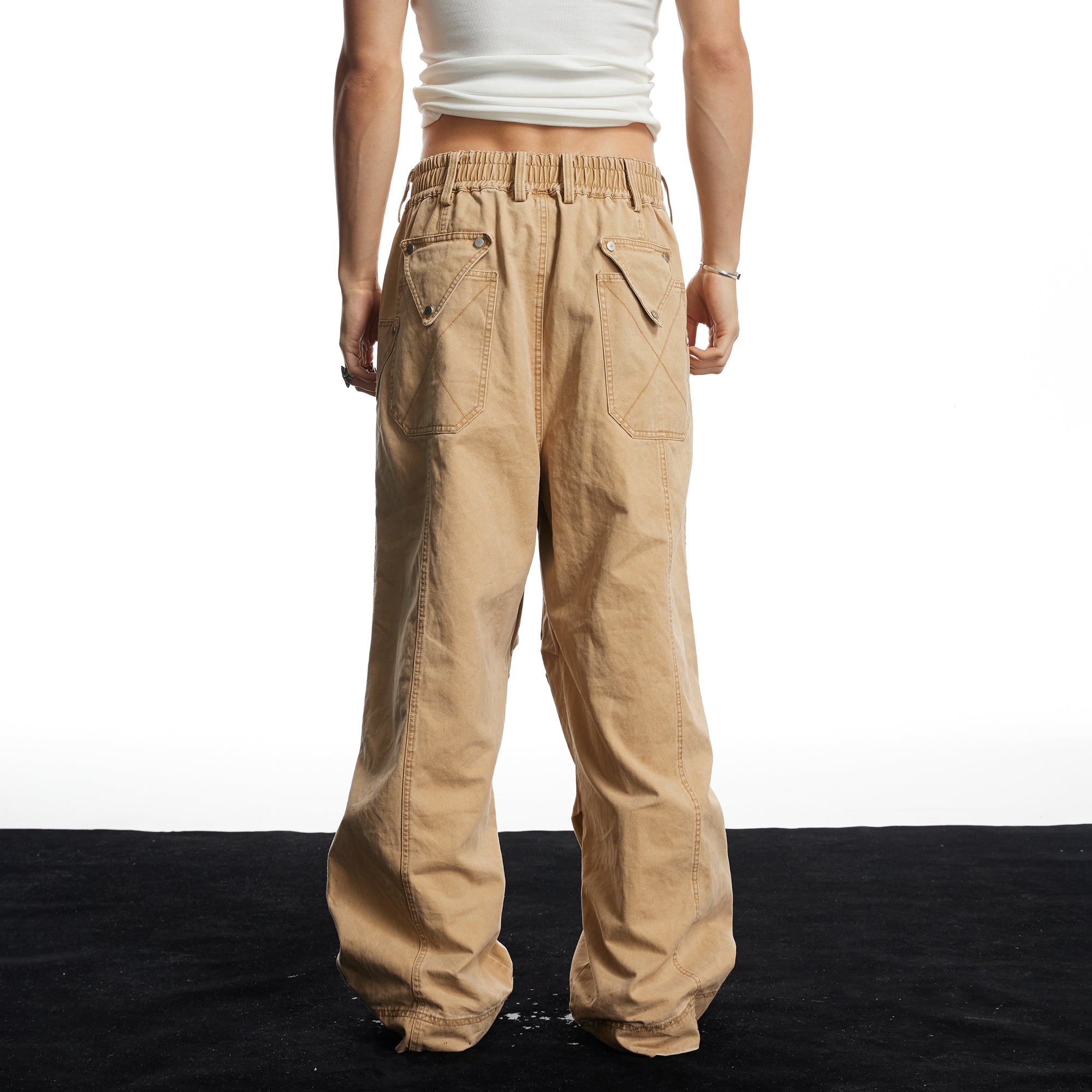 DND4DES Geometric Panel Studded Wide-Leg Pants