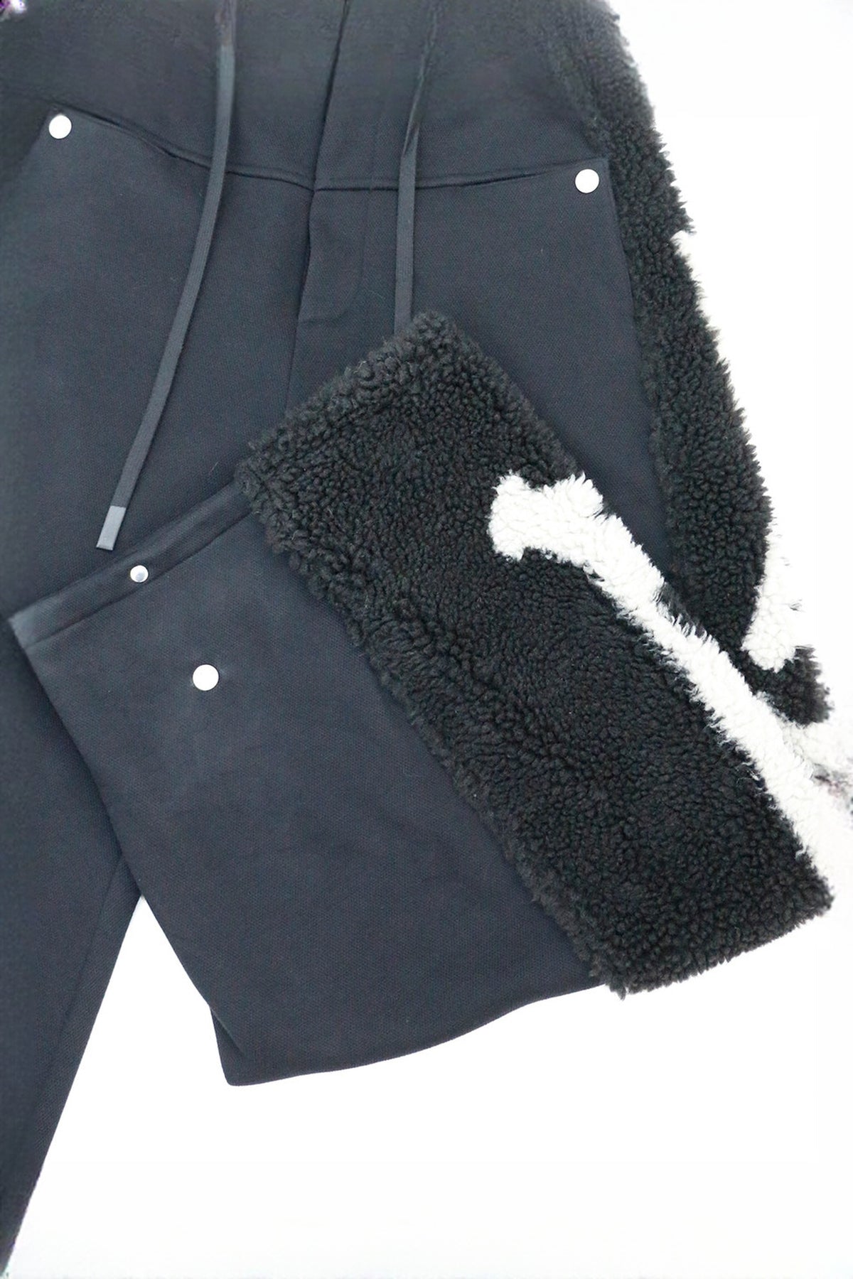 RELABEL Skeleton Graphic Spliced Deconstructed Wide-Leg Pants — flat-lay detail