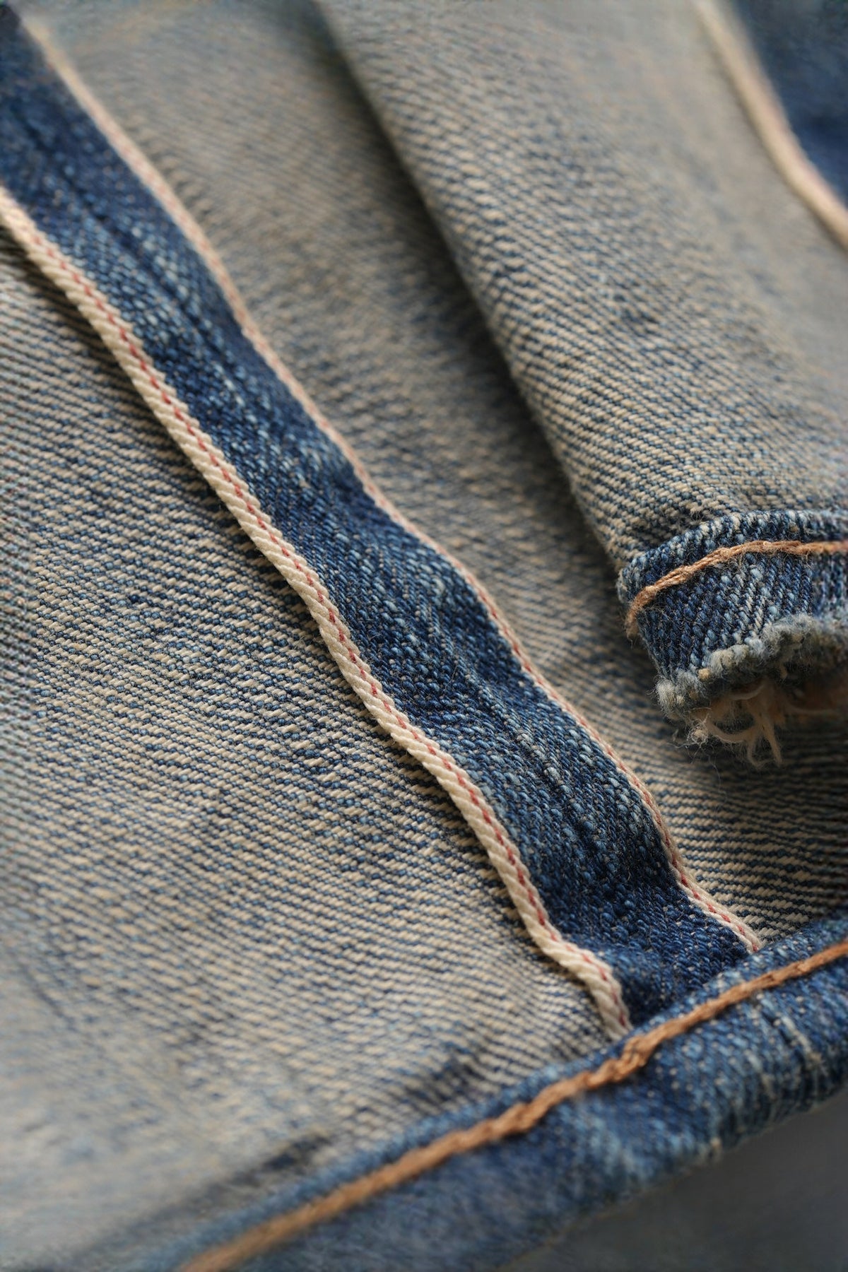 NEIGBORL Distressed Raw-Edge Selvedge Jeans — detail