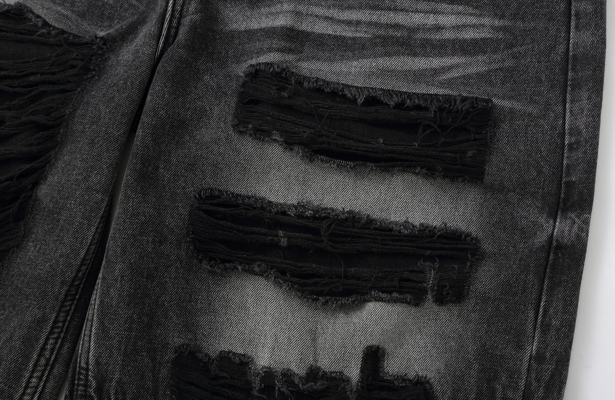 CLP Distressed Wide-Leg Washed Jeans