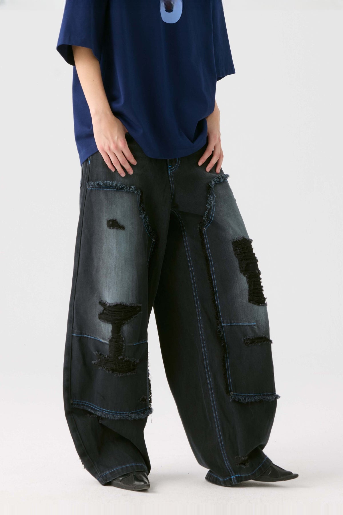 HAHAHA STUDIOS Distressed Washed Wide-Leg Jeans — half body
