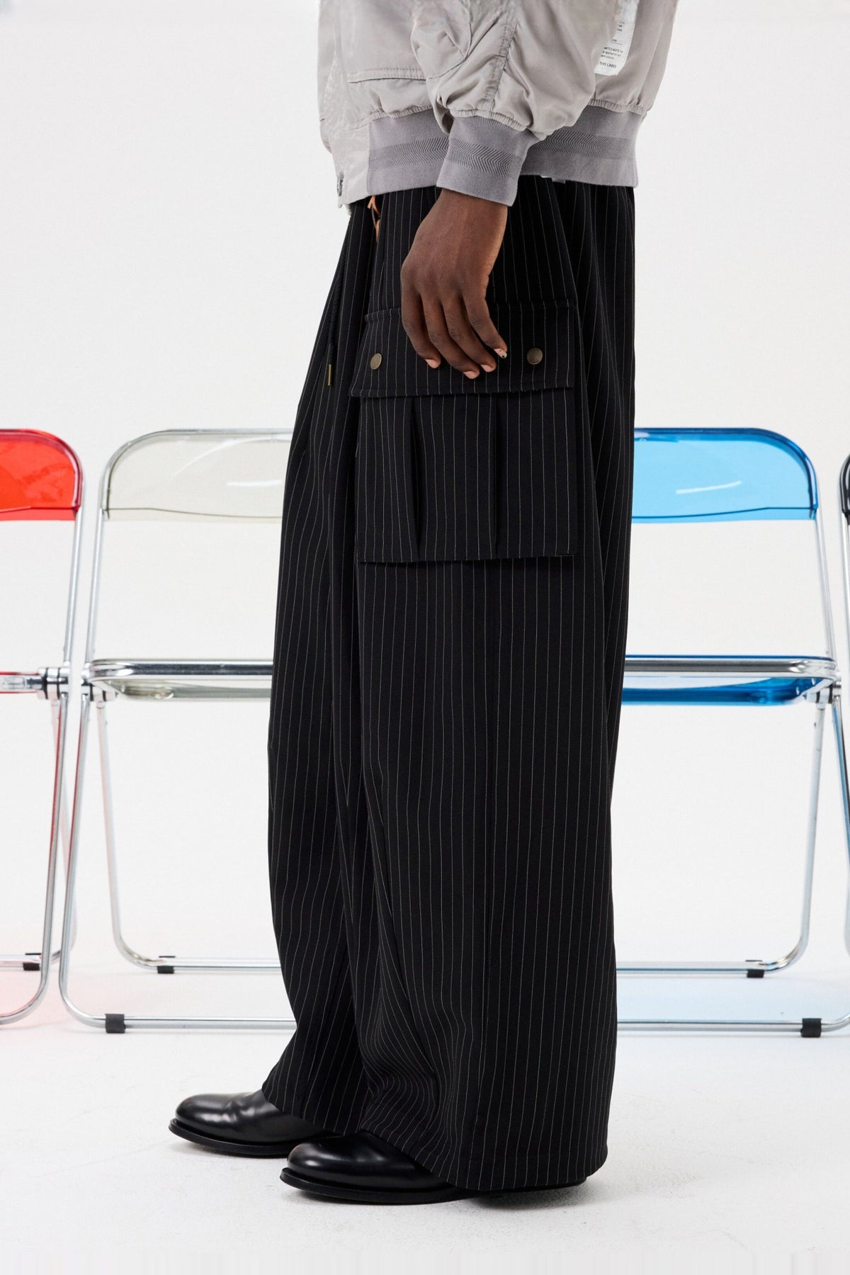UNLIMITED MOTE Striped Drawstring Balloon Wide-Leg Cargo Pants — half body · Black