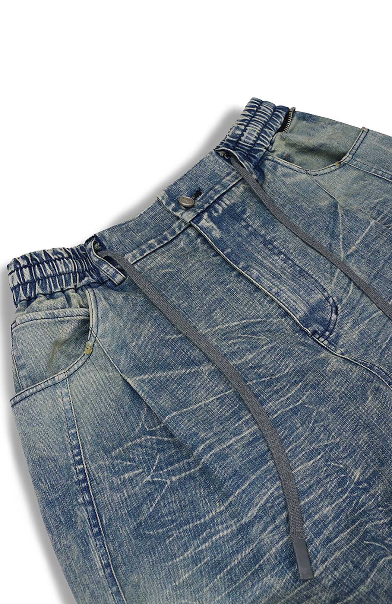 RELABEL Washed Curved-Blade Jeans