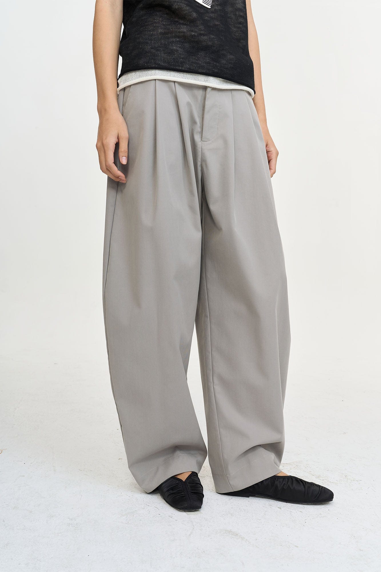 LEONSENSE Pleated Tencel Oversized Curved Pants, premium urban and streetwear designers apparel on PROJECTISR.com, LEONSENSE
