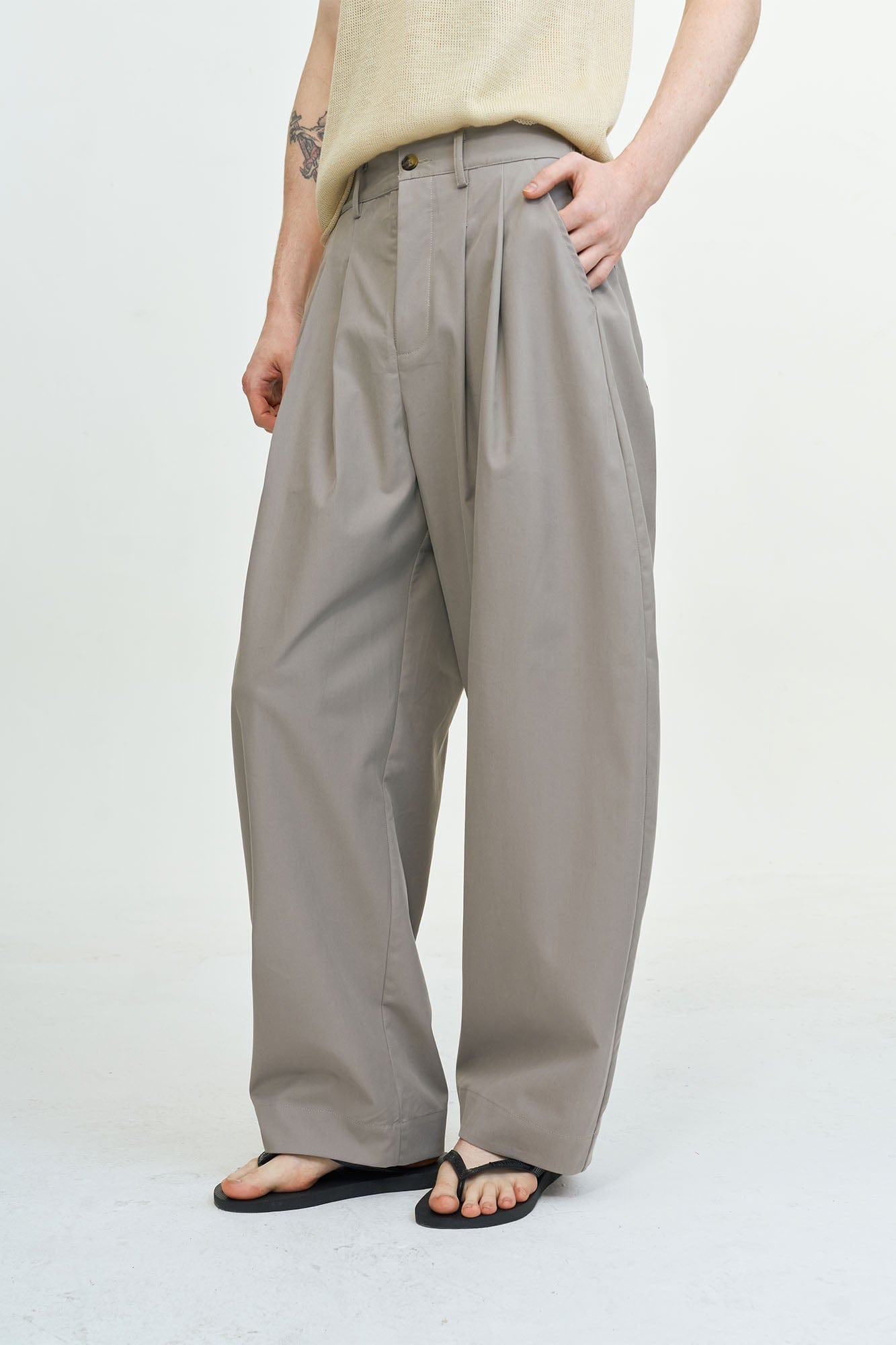 LEONSENSE Pleated Tencel Oversized Curved Pants, premium urban and streetwear designers apparel on PROJECTISR.com, LEONSENSE