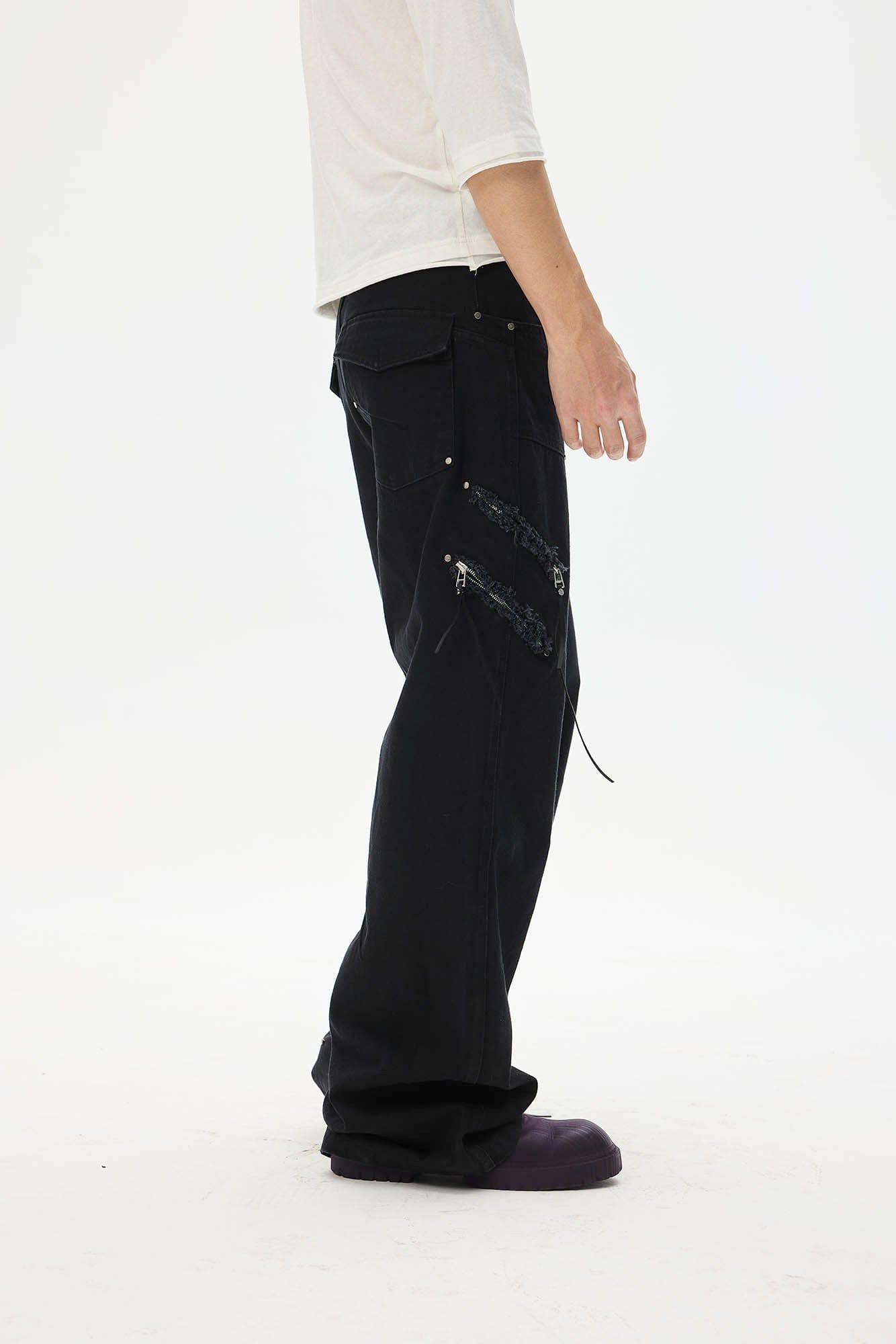 WHISTLEHUNTER Asymmetrical Zipper Frayed Flared Pants