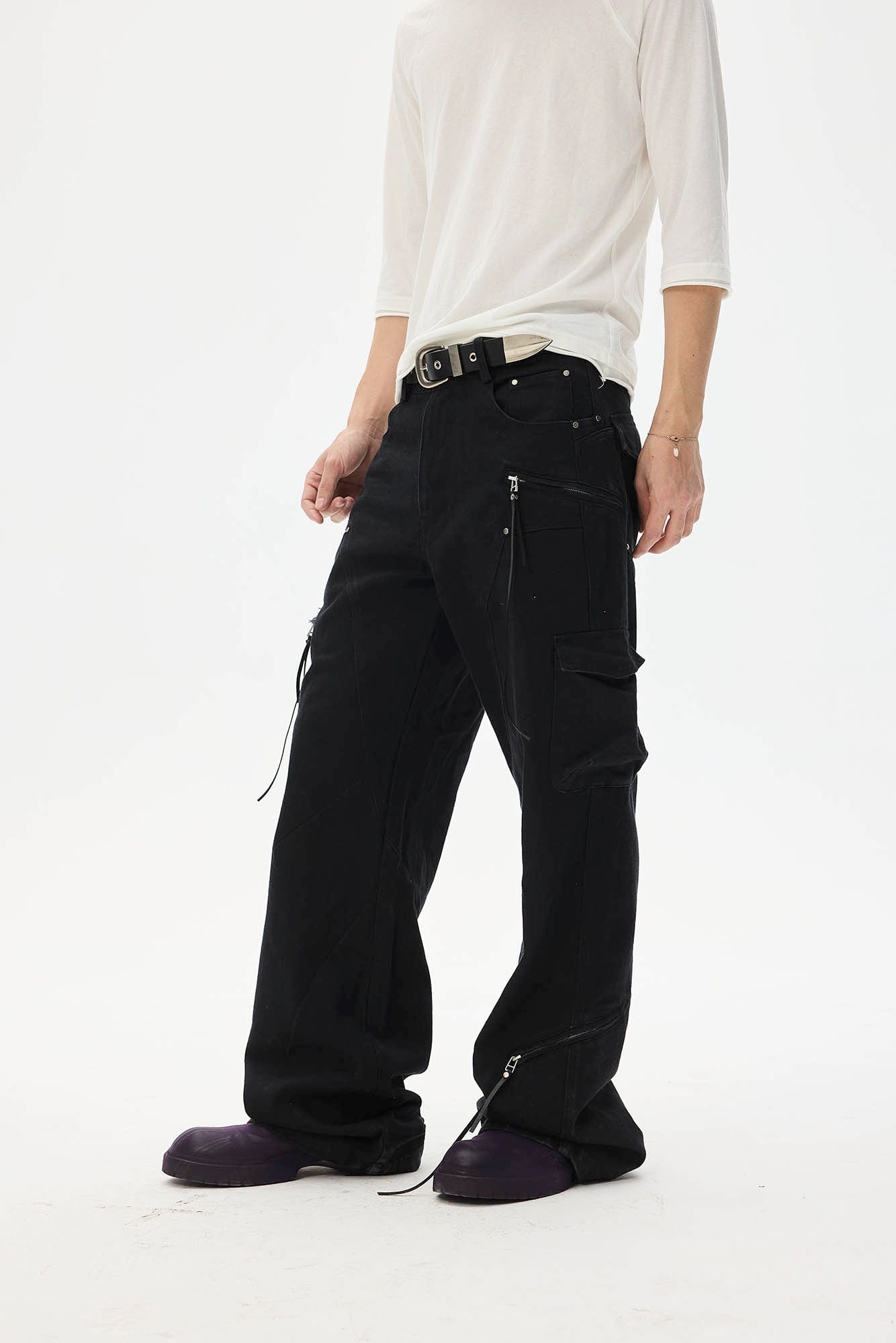 WHISTLEHUNTER Asymmetrical Zipper Frayed Flared Pants