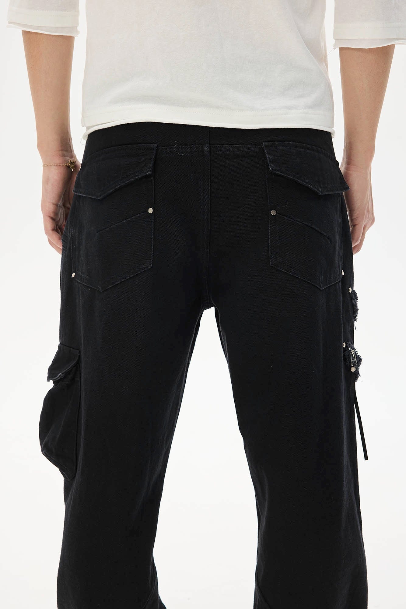 WHISTLEHUNTER Asymmetrical Zipper Frayed Flared Pants